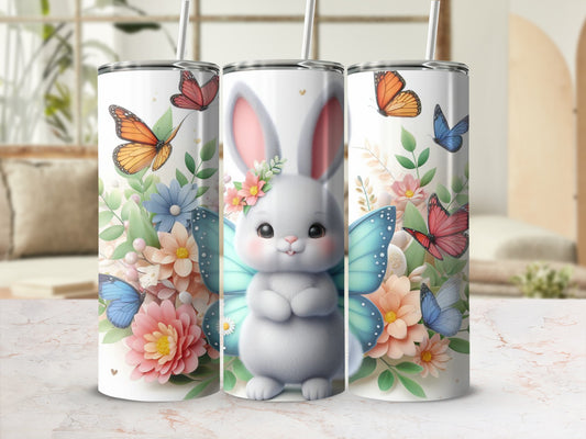 Cute bunny with butterflies and flowers on a tumbler cup.