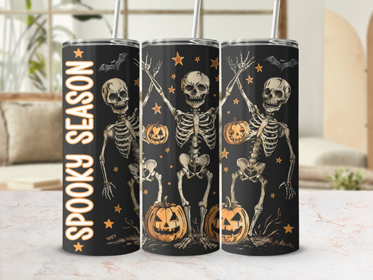 Tumblers feature skeletons, pumpkins, bats, and stars with "Spooky Season" text.