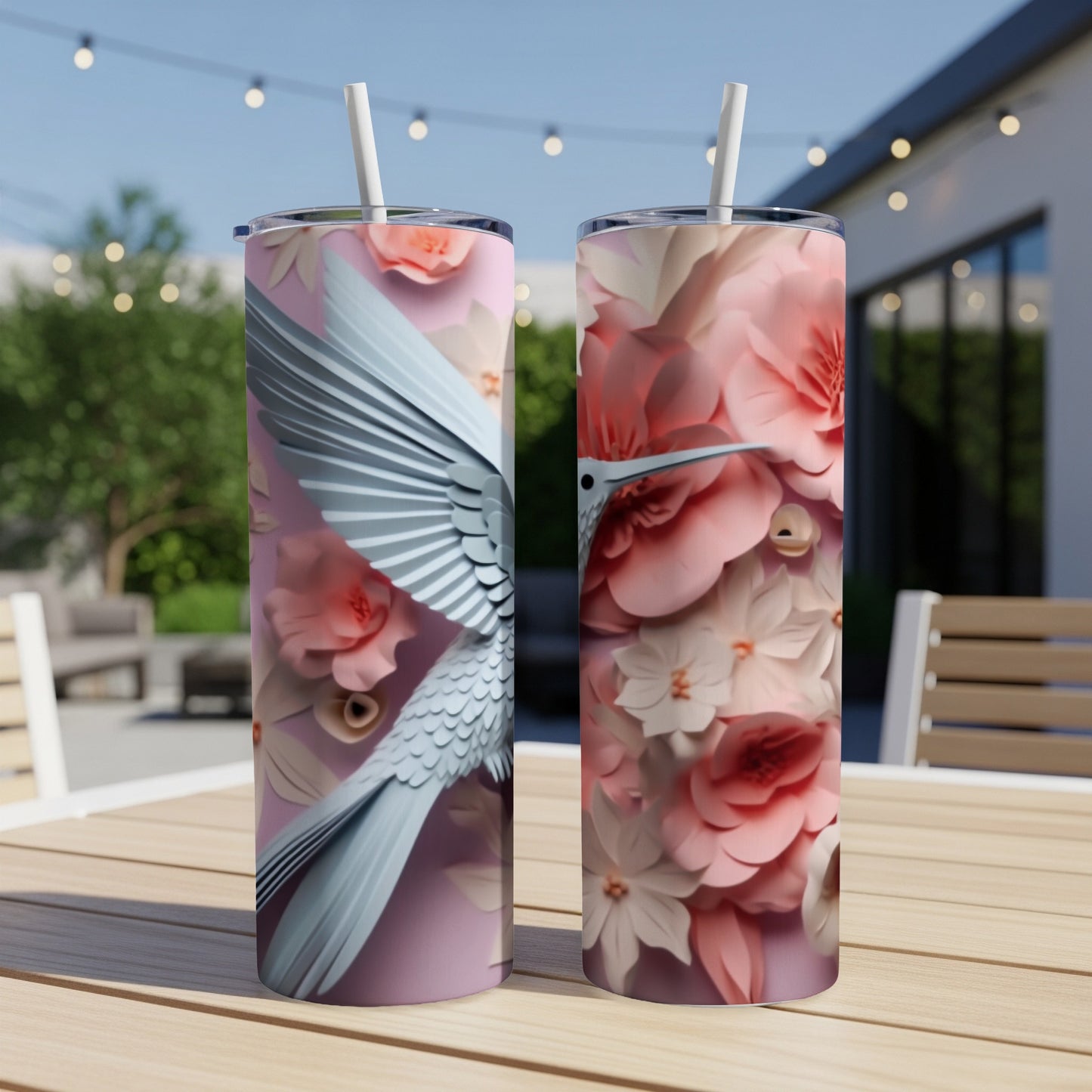 Two tumblers with a hummingbird and floral design.