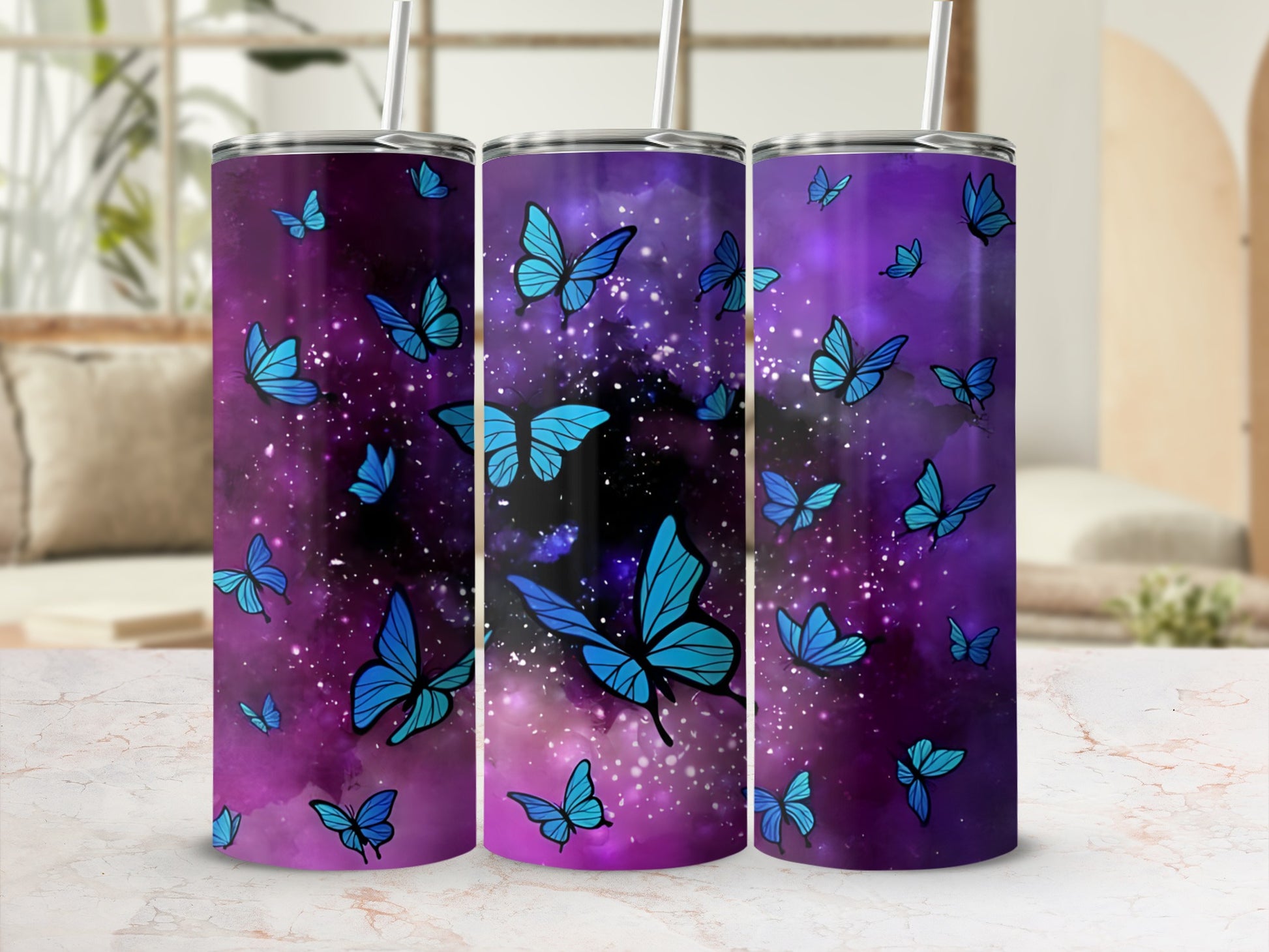 Purple tumbler with scattered blue butterflies, featuring a galaxy background.