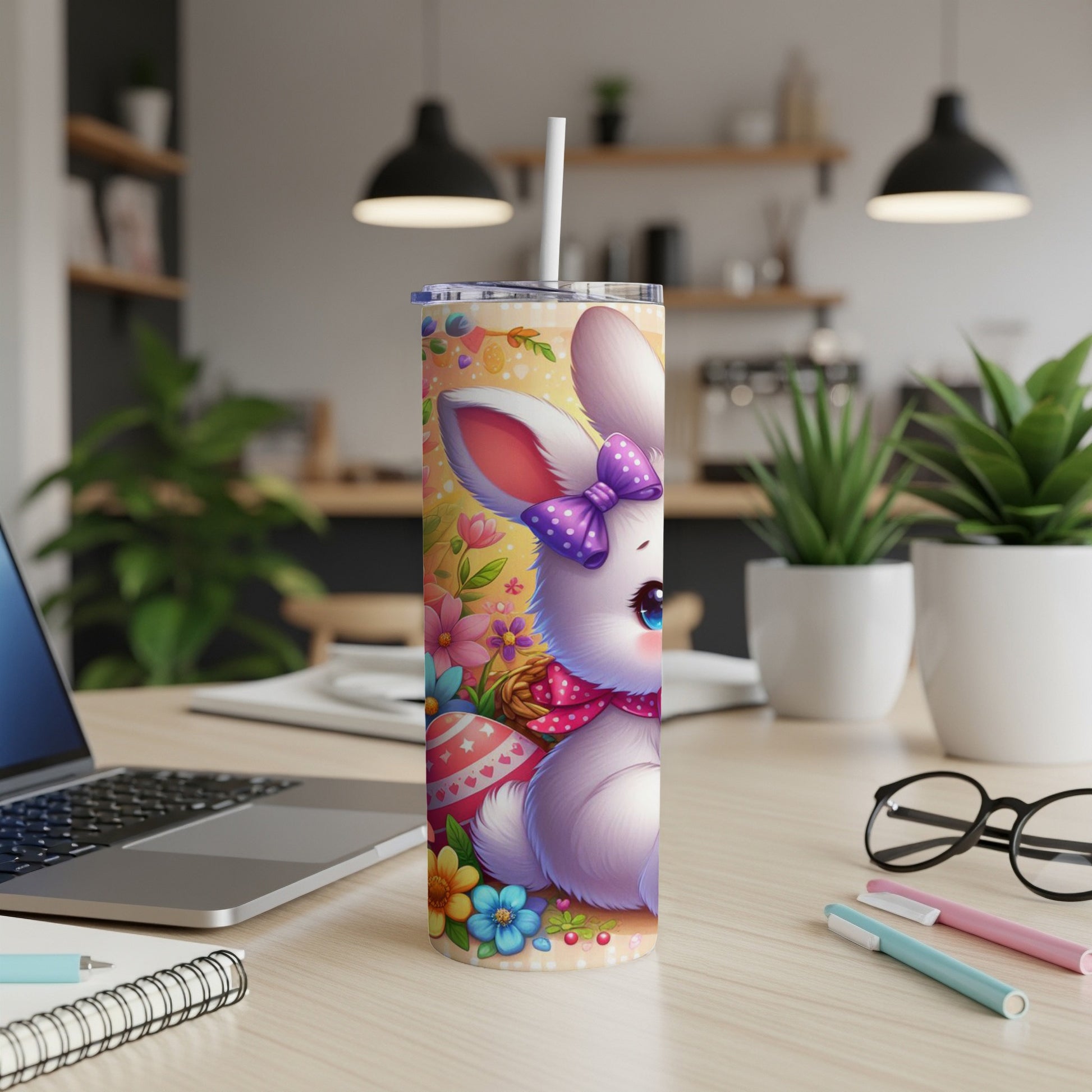Easter bunny tumbler with pastel eggs and flowers.