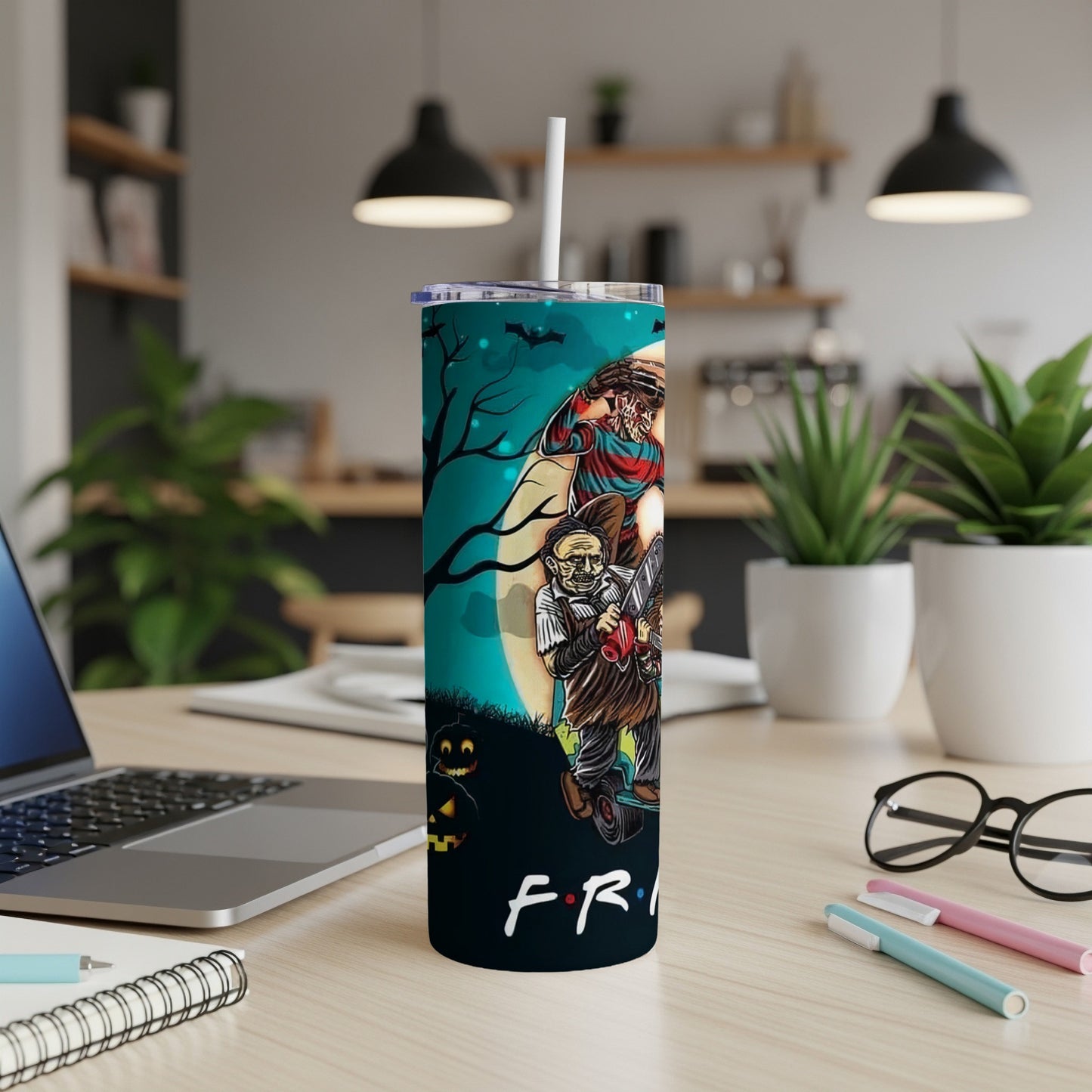 Freddy Krueger and Jason Voorhees on a Halloween tumbler.