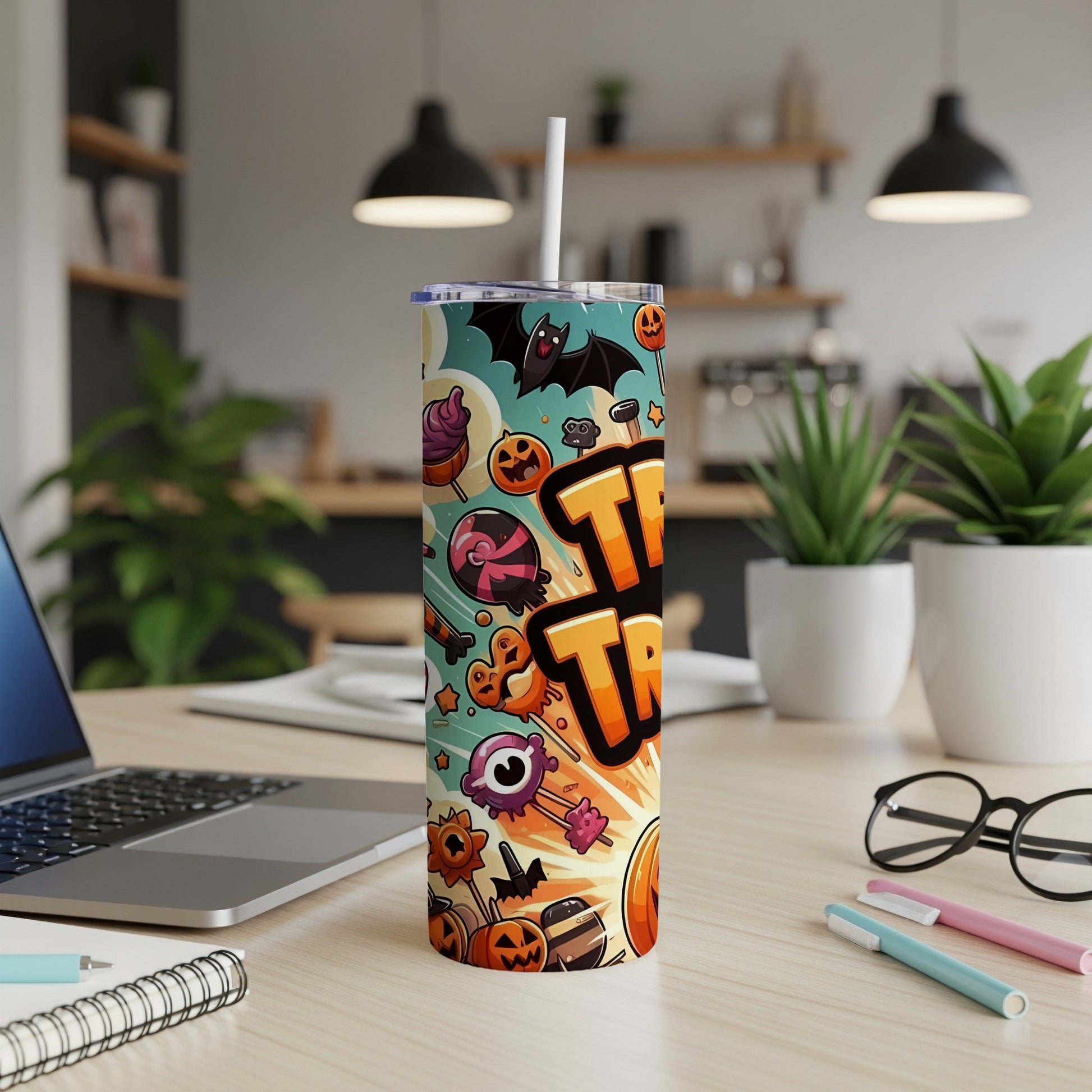 Halloween tumbler with bats, pumpkins, and candy, featuring "Trick or Treat" text.
