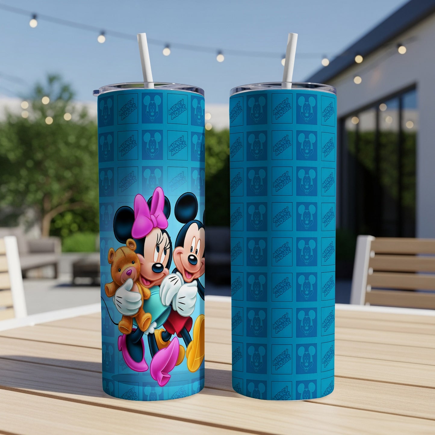 Mickey and Minnie Mouse with teddy bear on blue Mickey Mouse pattern tumbler.