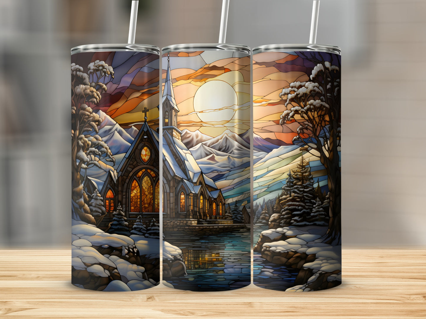 Three stained glass tumblers featuring a snowy church scene with mountains and a large moon.
