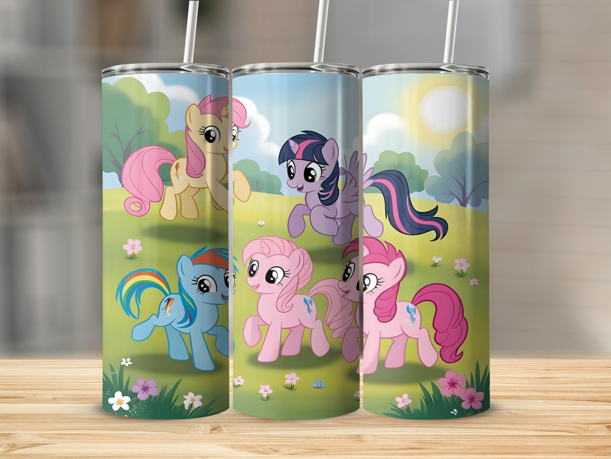 My Little Pony characters on a colorful tumbler with floral accents.