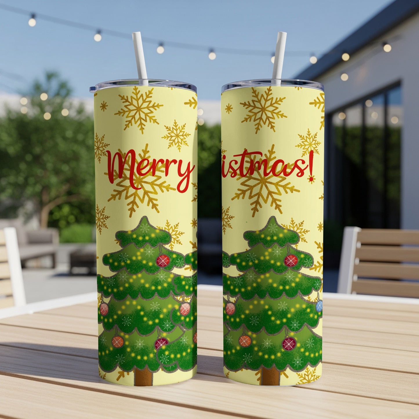 Two tall tumblers with Christmas trees and "Merry Christmas" text on a yellow background.