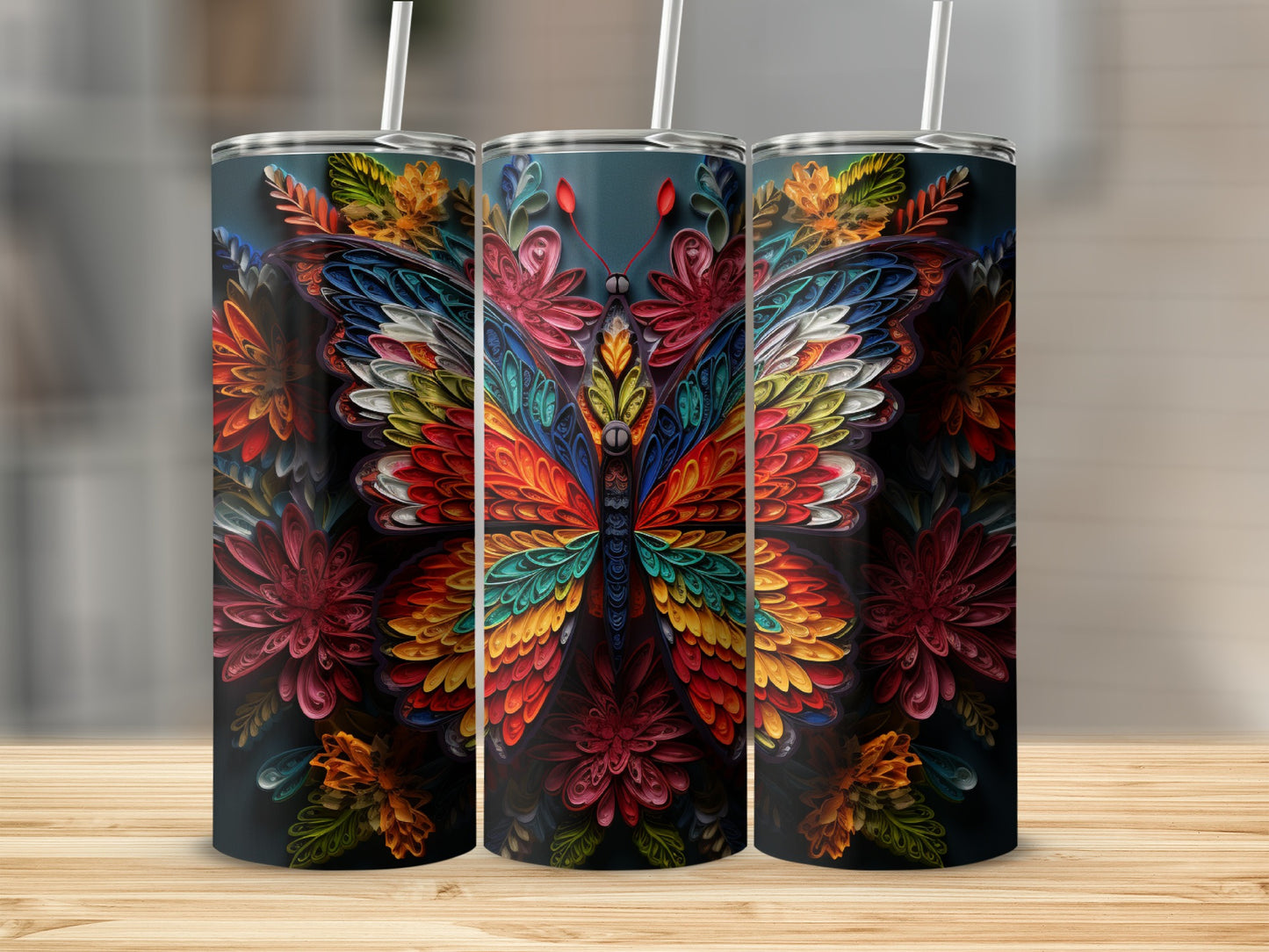 Triptych of tumblers featuring a colorful, detailed butterfly and floral design.