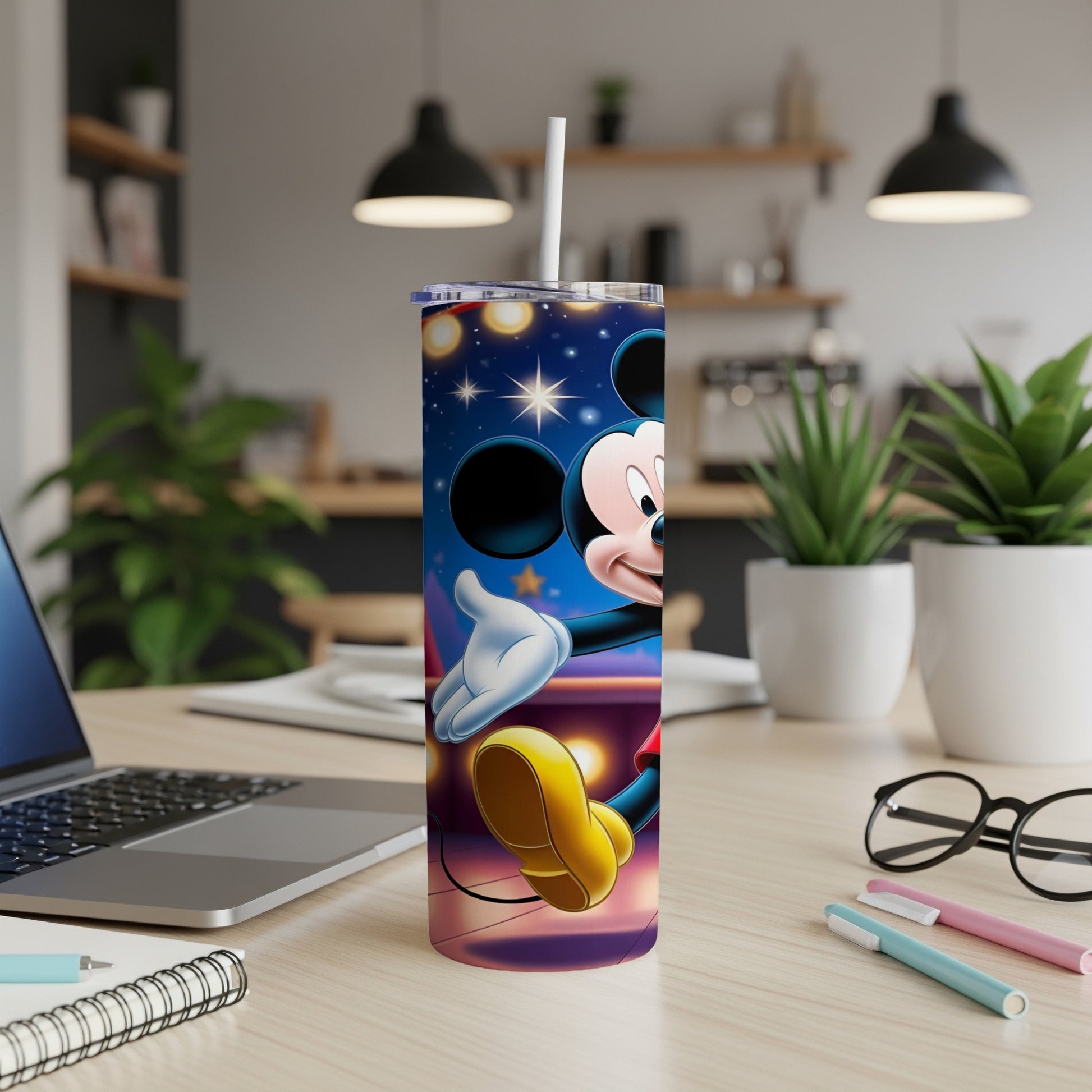 Mickey Mouse on a tumbler with a starry background.
