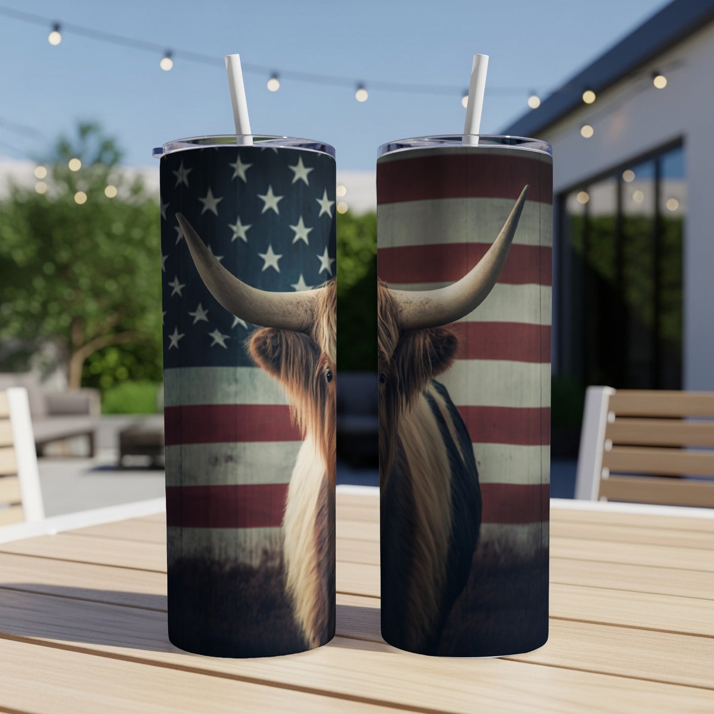 Highland cow with American flag pattern on two tumblers.