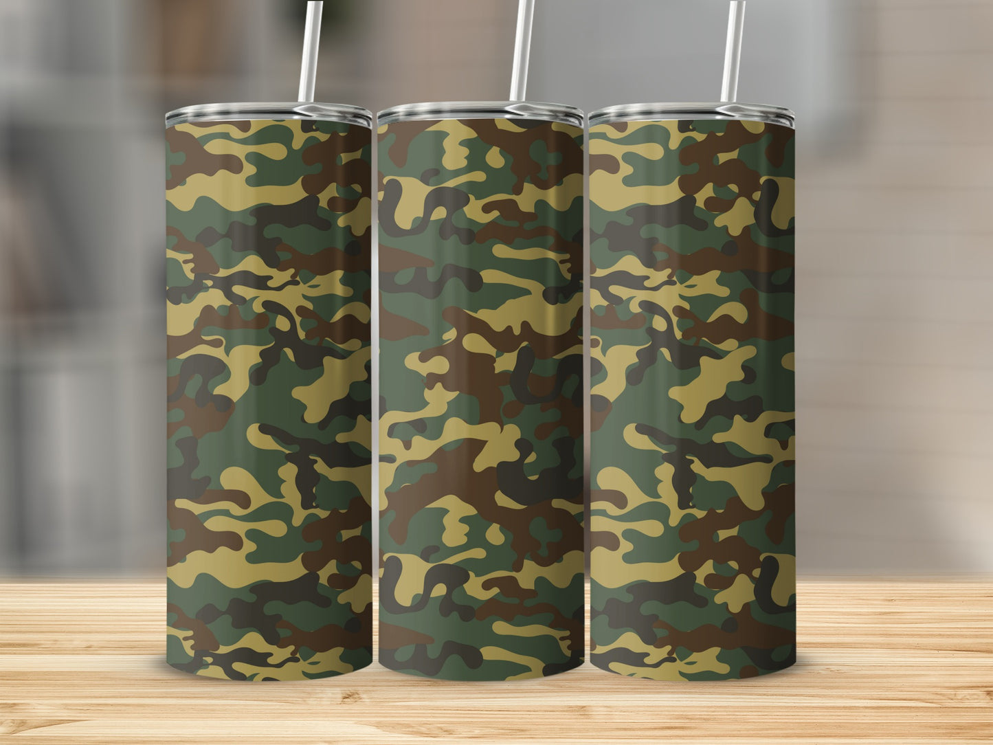 Three tall tumblers with a green, brown, and tan camouflage pattern.