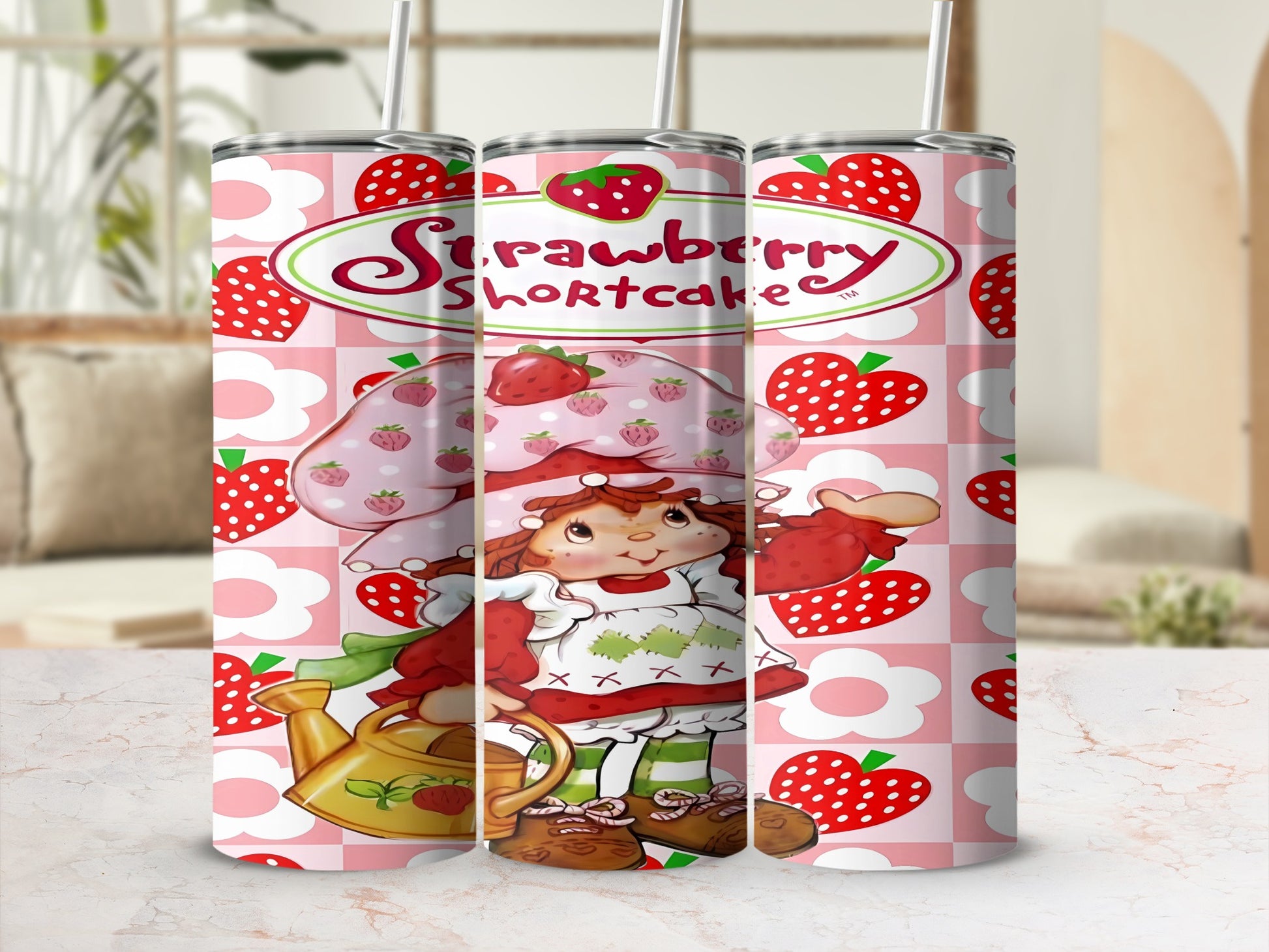 Strawberry Shortcake tumbler with strawberries and flowers pattern.