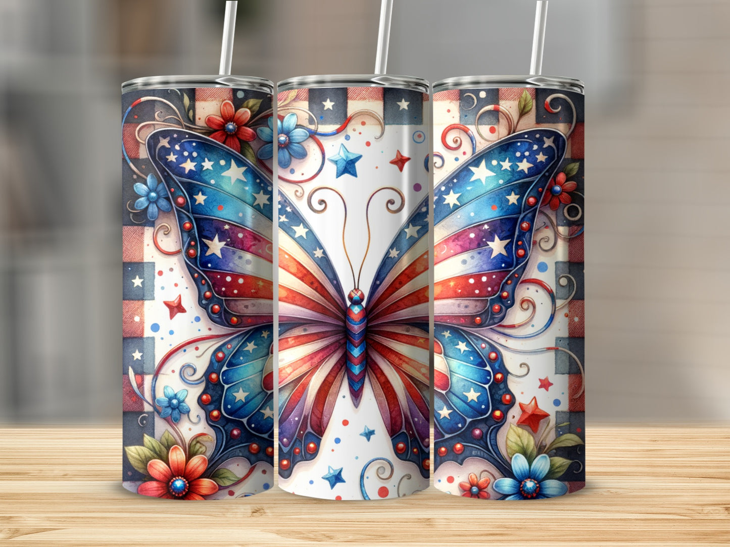 Three patriotic-themed tumblers with a butterfly and floral design.