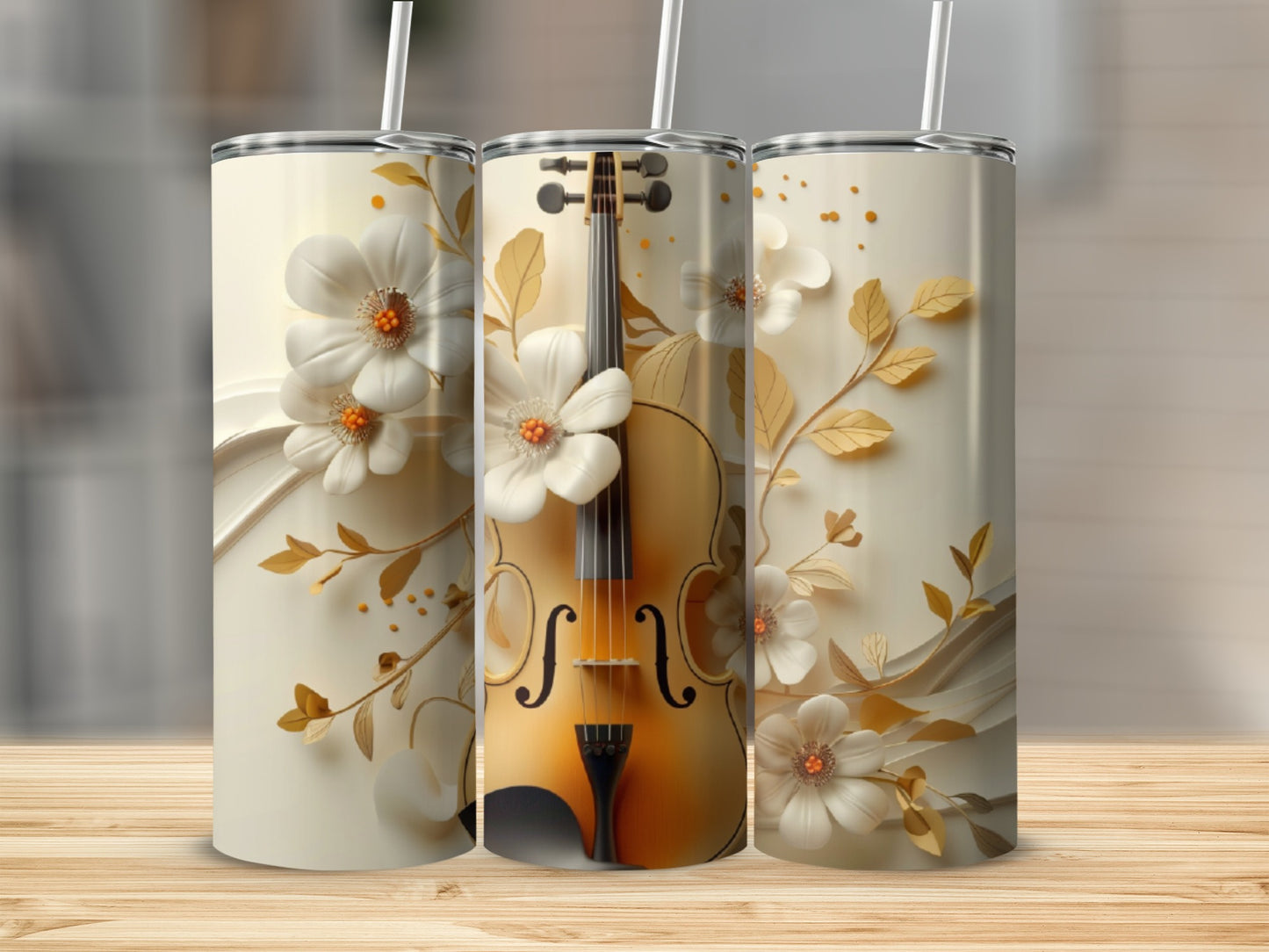 Floral violin design on a set of three white tumblers with straws.