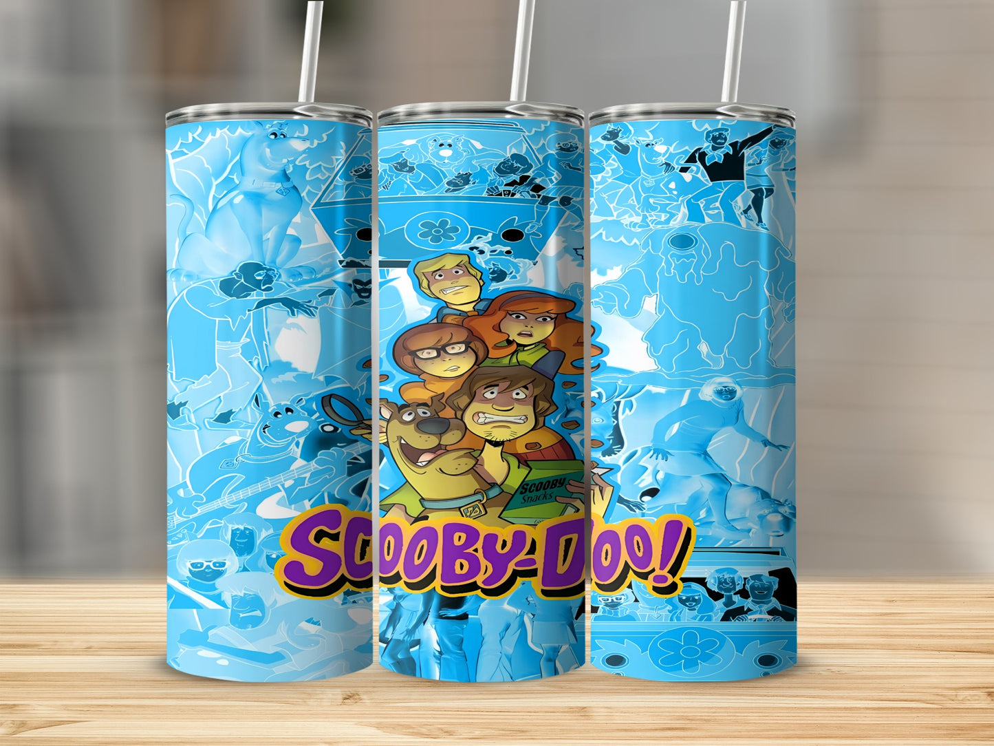 Scooby-Doo characters on a blue tumbler with a repeating pattern.