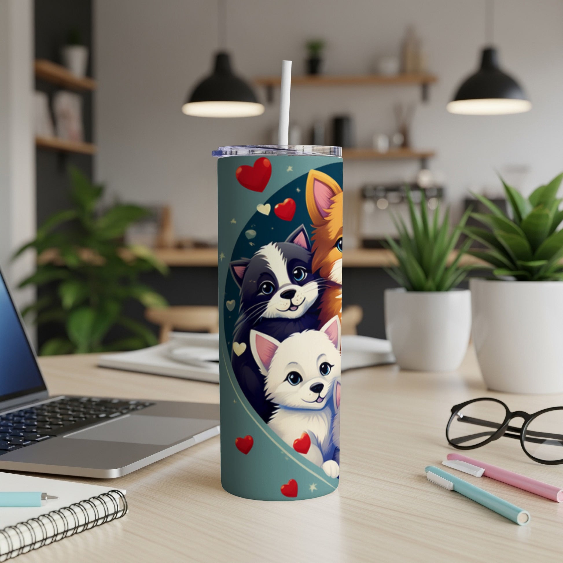 Cute cartoon cats and dogs on a teal tumbler with hearts.