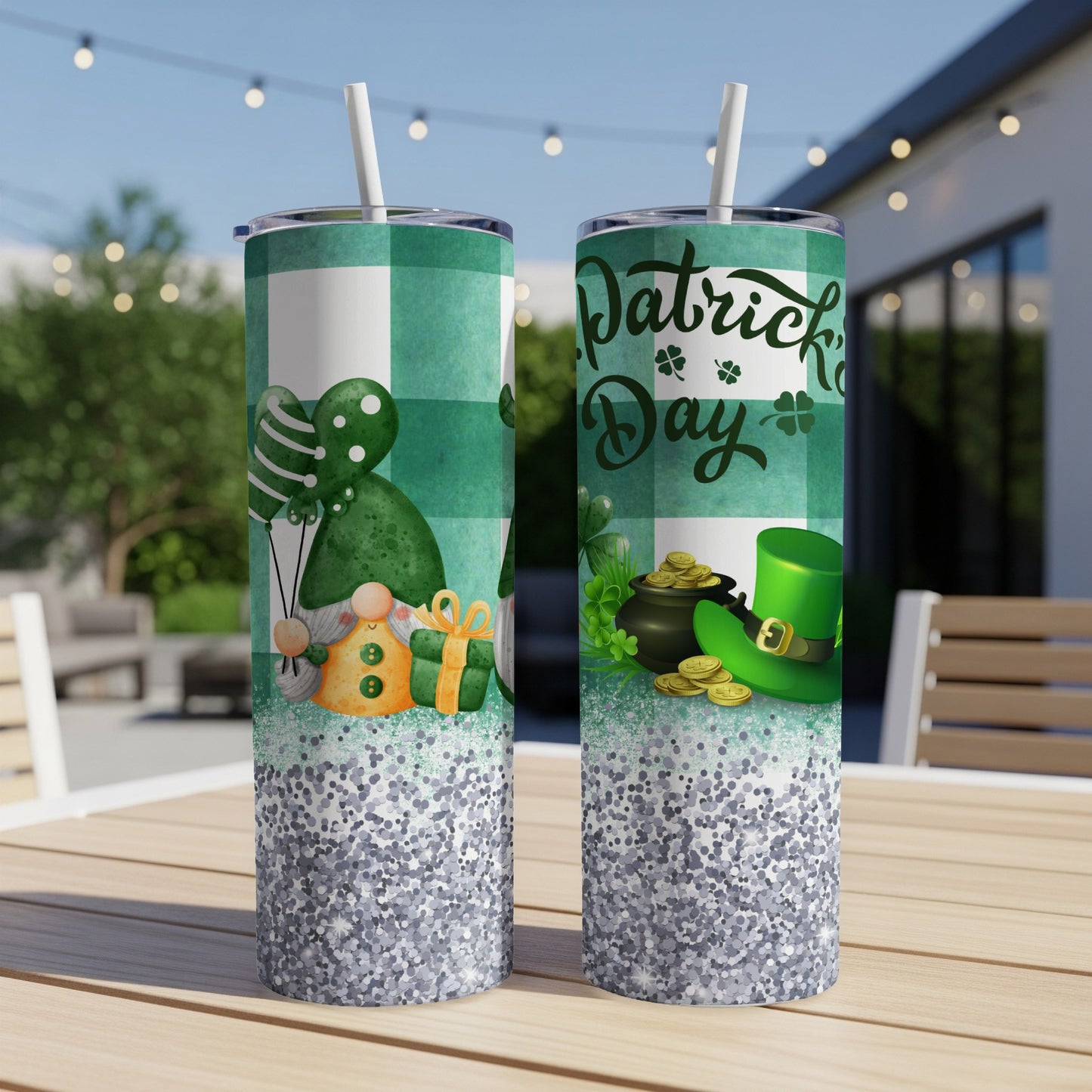 Two green plaid tumblers with St. Patrick's Day gnomes, shamrocks, and glitter.