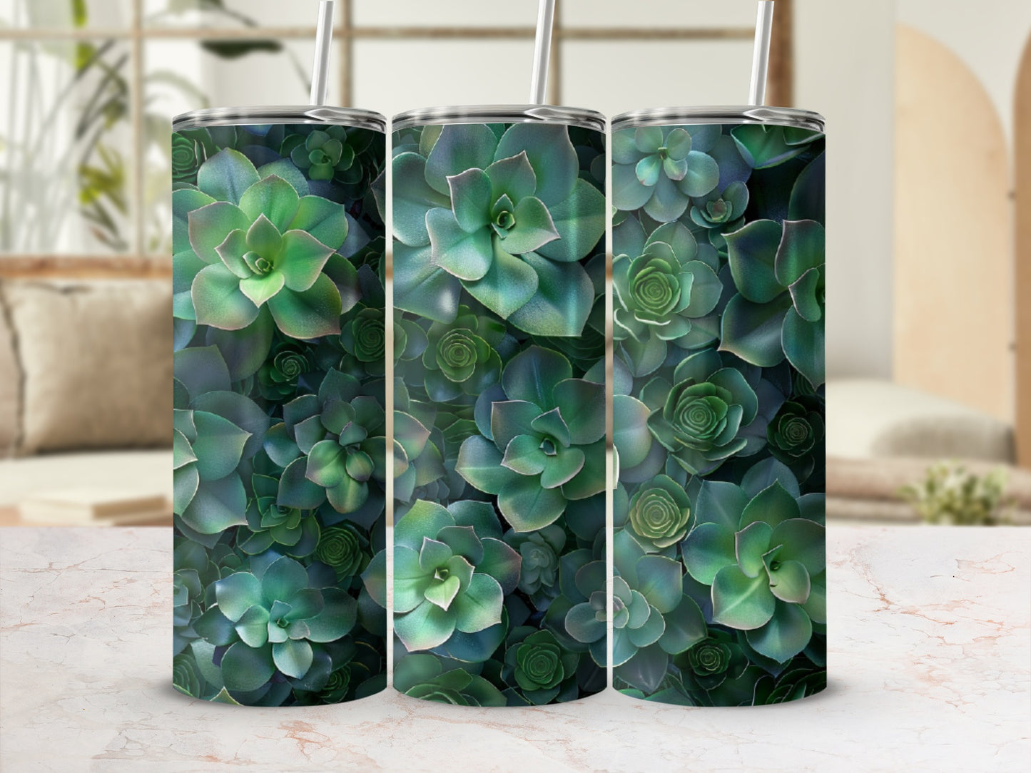 Three tumblers adorned with a dense pattern of green succulents.