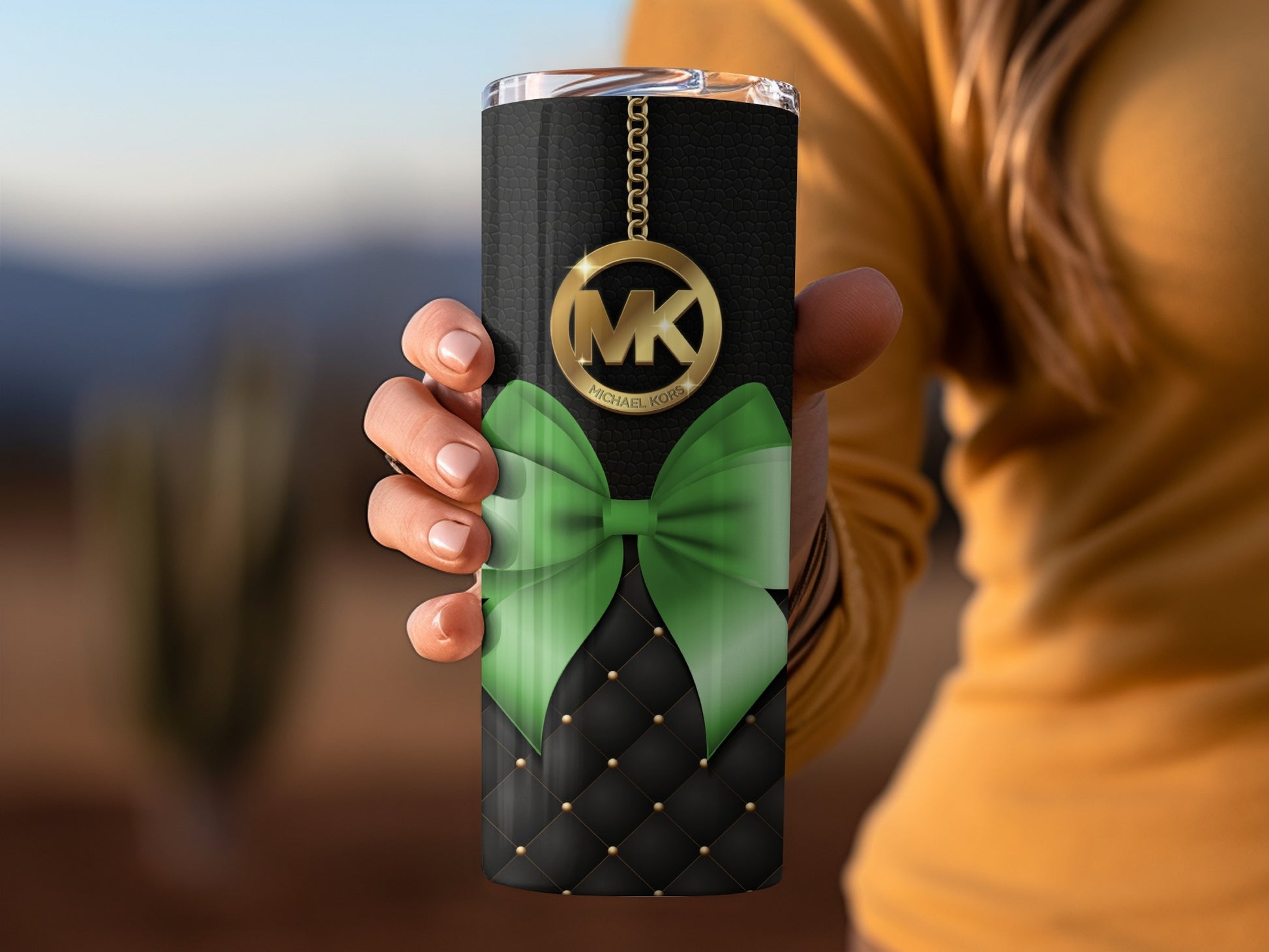 Elegant Green Bow and Gold MK Charm Tumbler Design