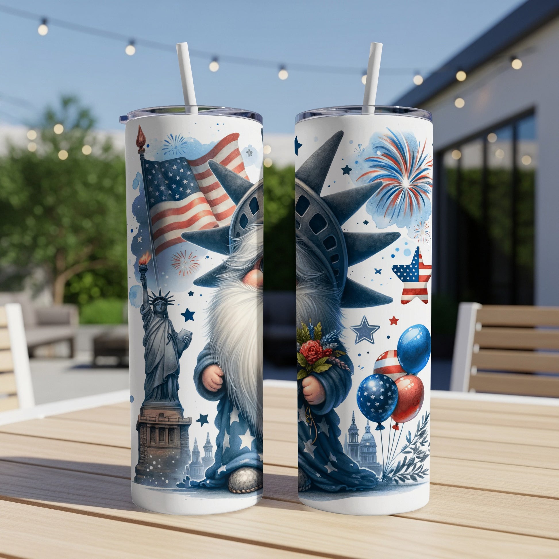 Gnome holding Statue of Liberty, fireworks, and balloons on a tumbler.
