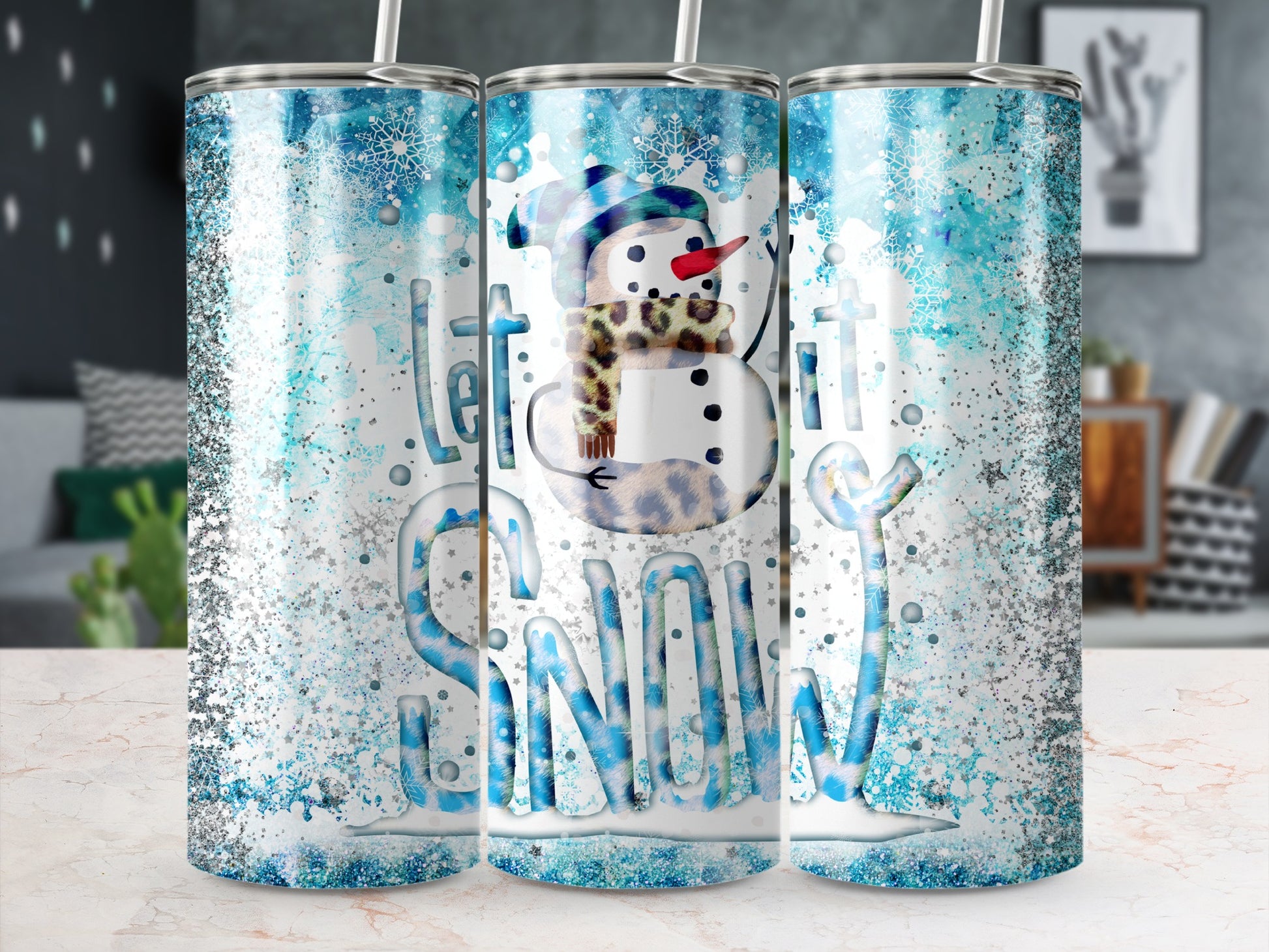 Snowman with scarf and hat on a glittery tumbler with "Let it Snow" text.