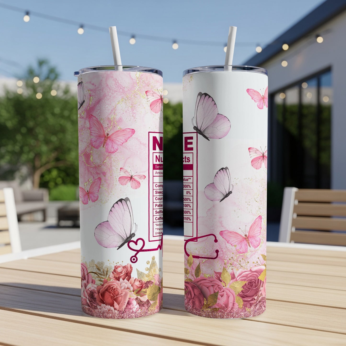 Pink butterflies and roses on a white tumbler with nurse-related text.