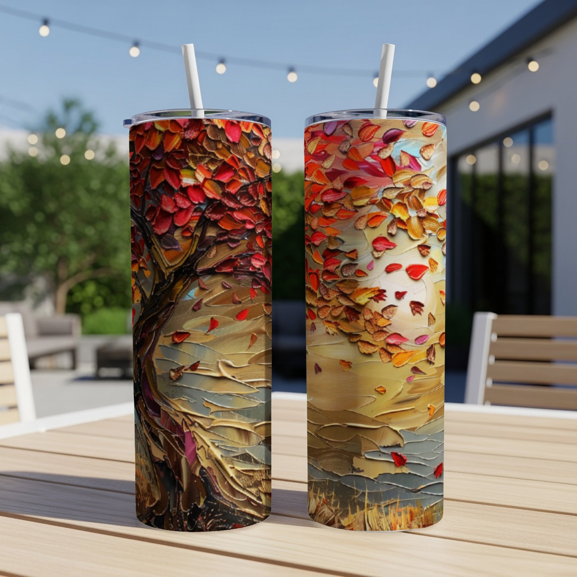Two tumblers with a textured oil painting of a vibrant autumn tree.