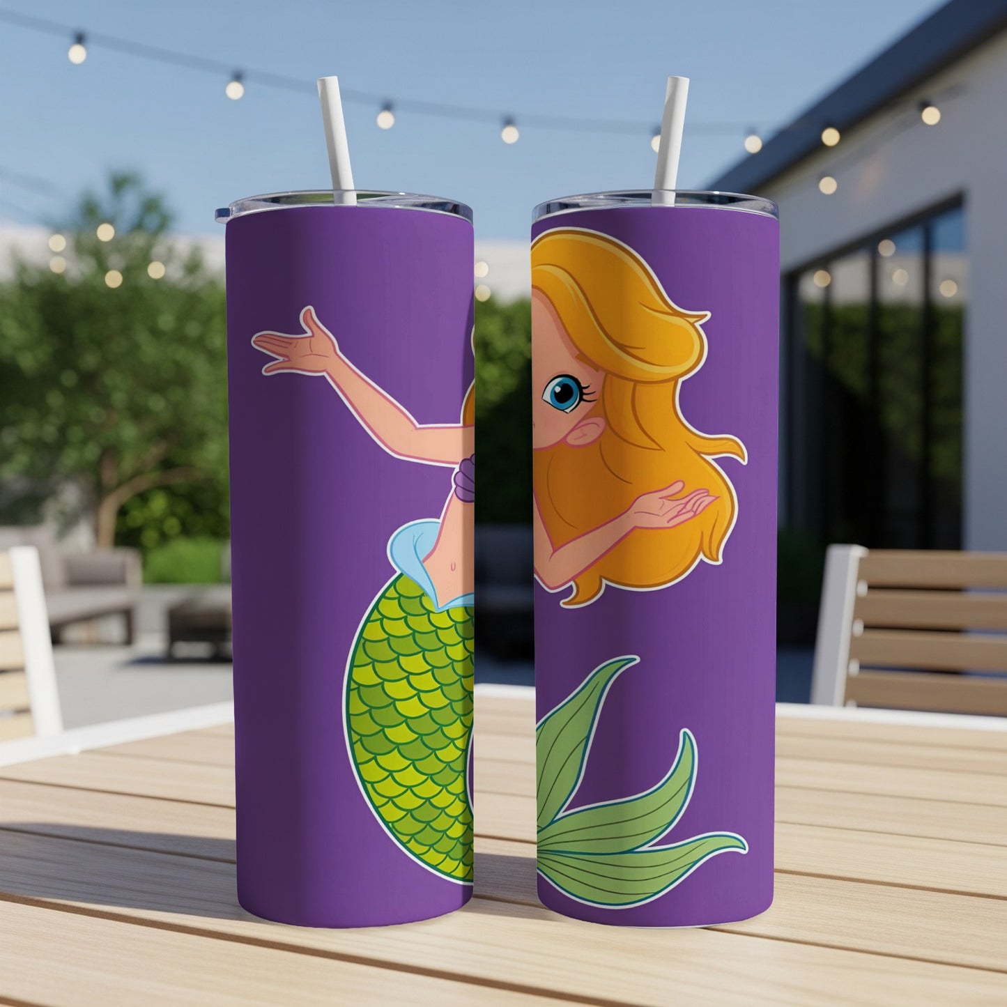 Purple tumbler with a cartoon mermaid illustration and straw.