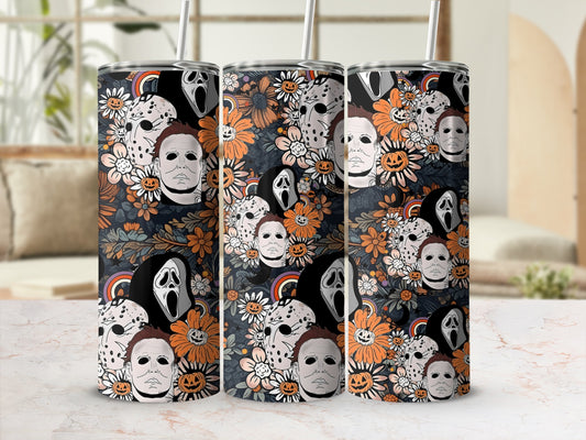 Tumbling tower of Halloween themed tumblers with horror movie characters and floral patterns.