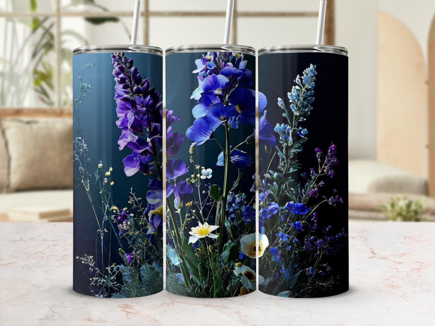 Three tumblers with a dark floral design featuring purple and blue flowers.