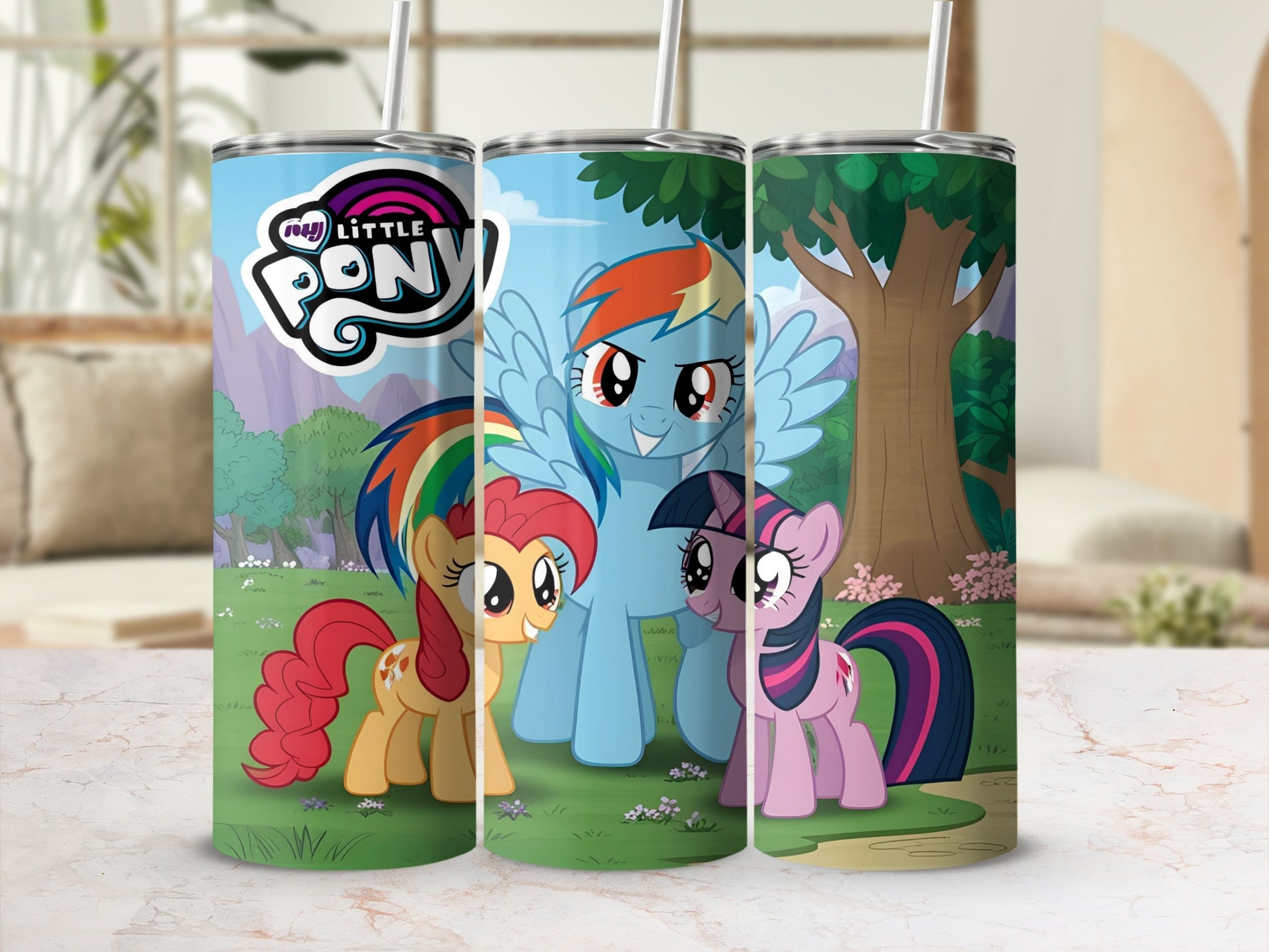 My Little Pony characters Rainbow Dash, Applejack, and Twilight Sparkle on a tumbler.