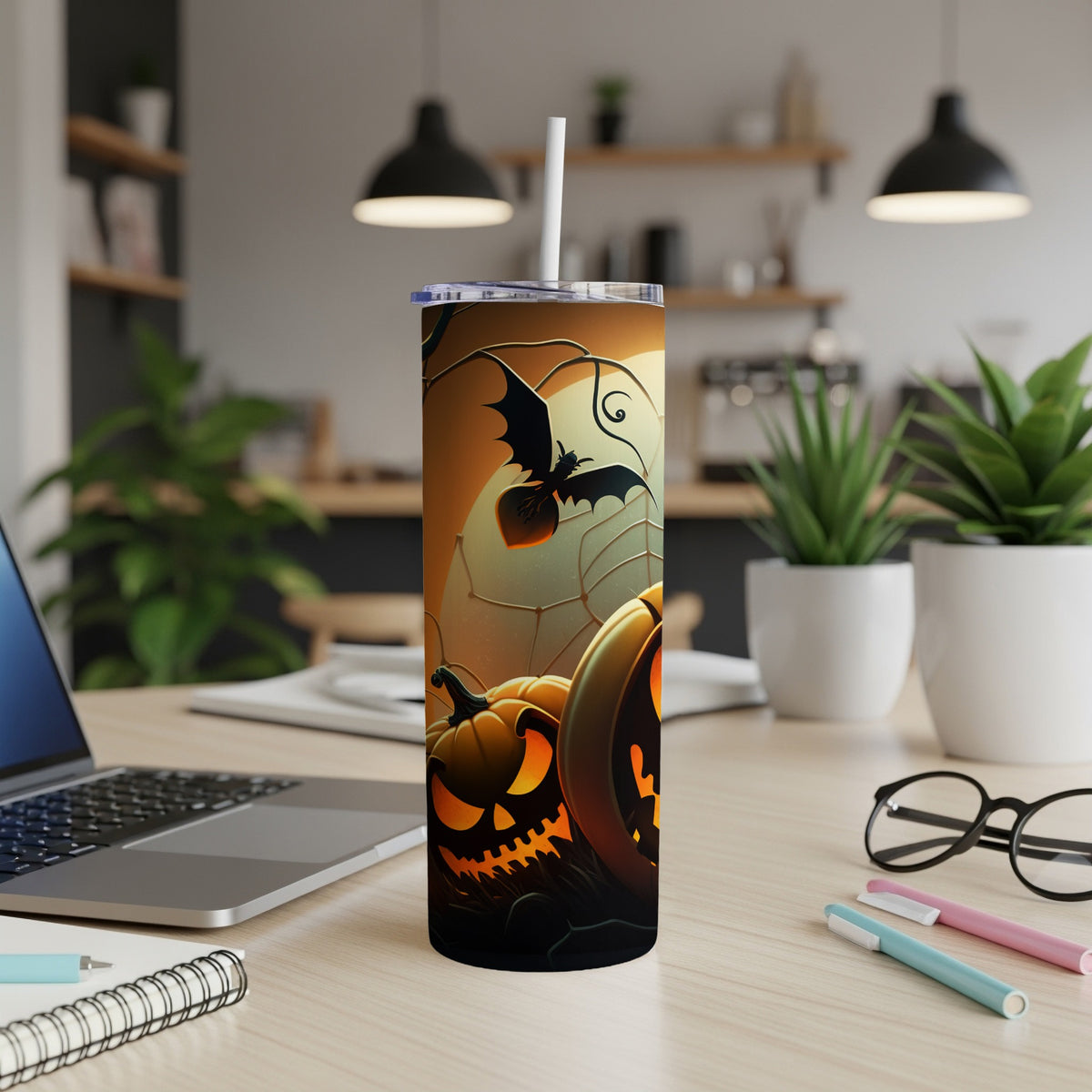 Tumbler with Halloween pumpkins, bats, and spiderweb design.