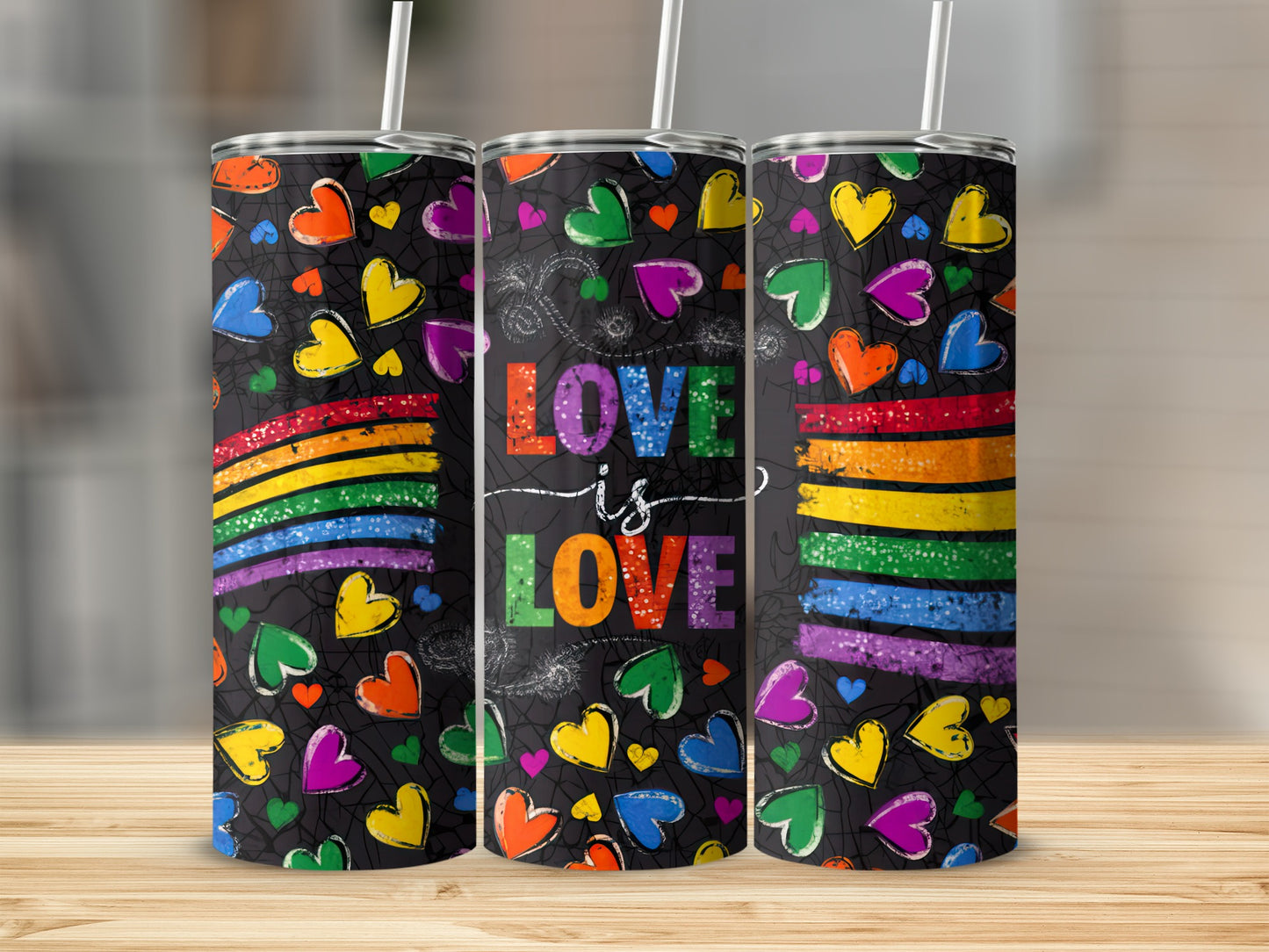 Rainbow hearts and "Love is Love" text on three tumblers.