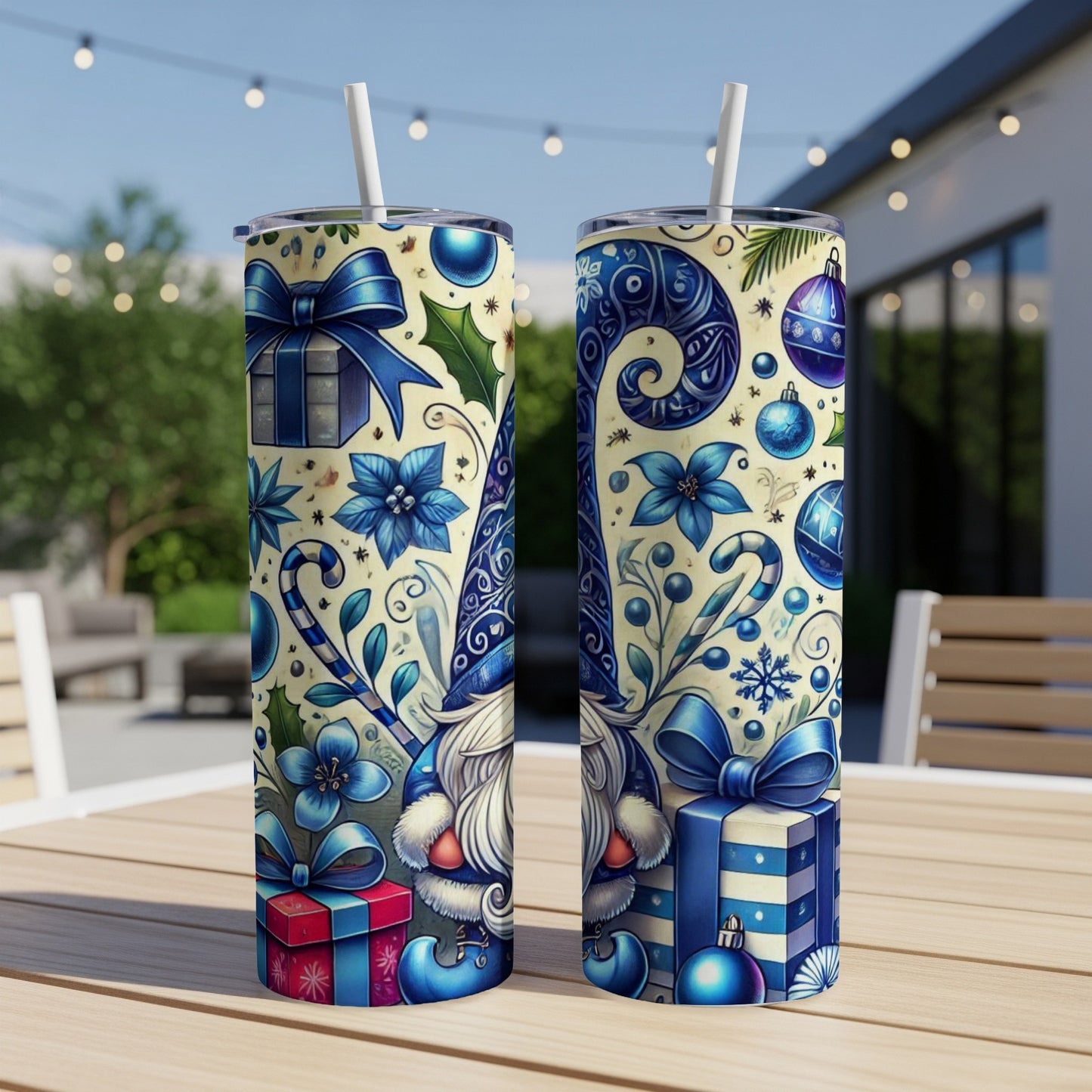 Two festive Christmas tumblers featuring gnomes, snowflakes, and gifts.