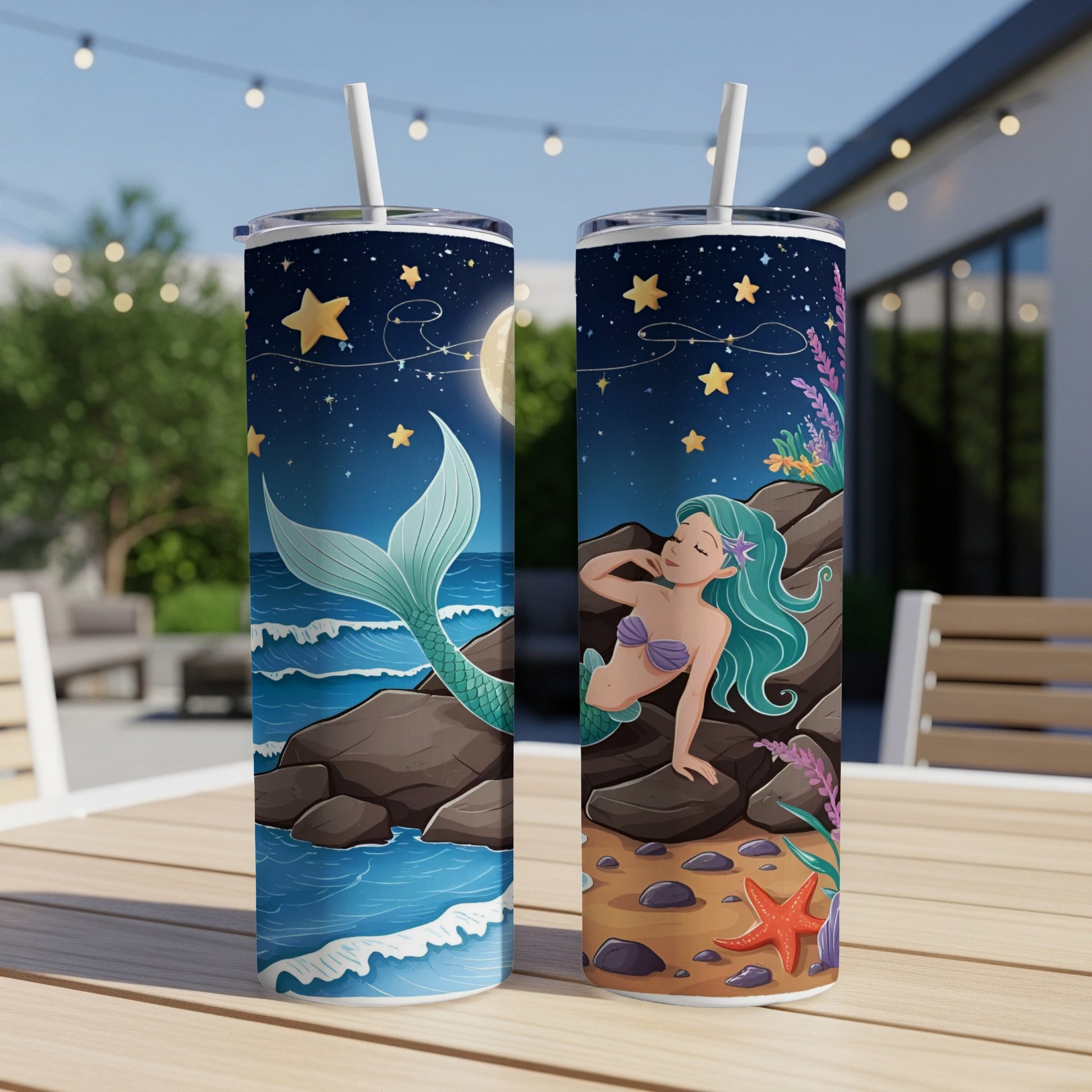 Two mermaid tumblers with starry night sky and ocean scenes.