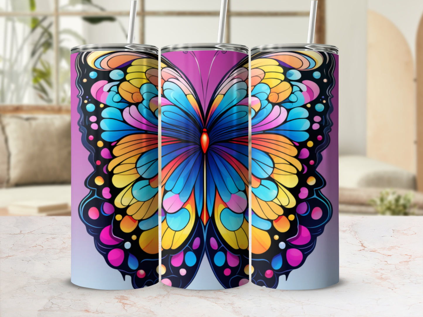 Three tumblers featuring colorful butterfly wings design.