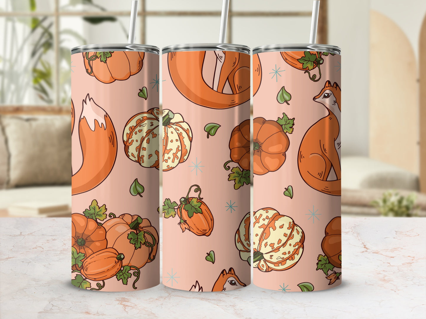 Orange fox and decorative pumpkins pattern on a pale pink tumbler.