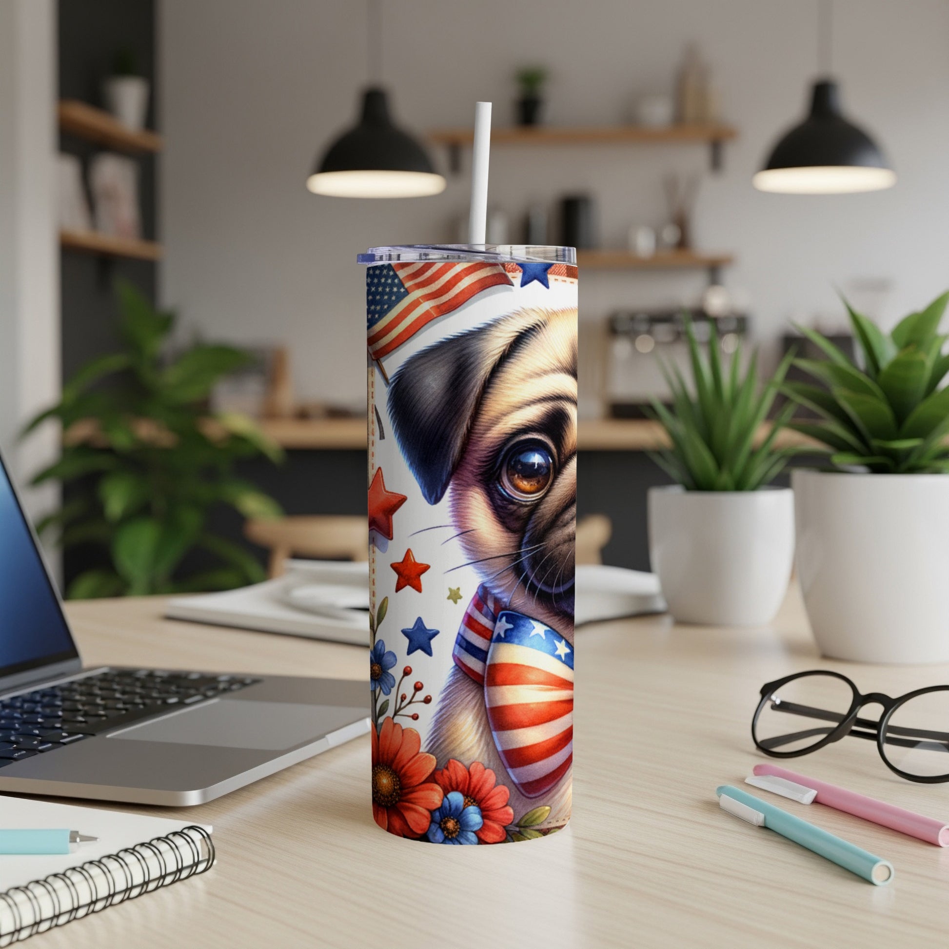 Pug wearing American flag bandana on patriotic tumbler with flowers.