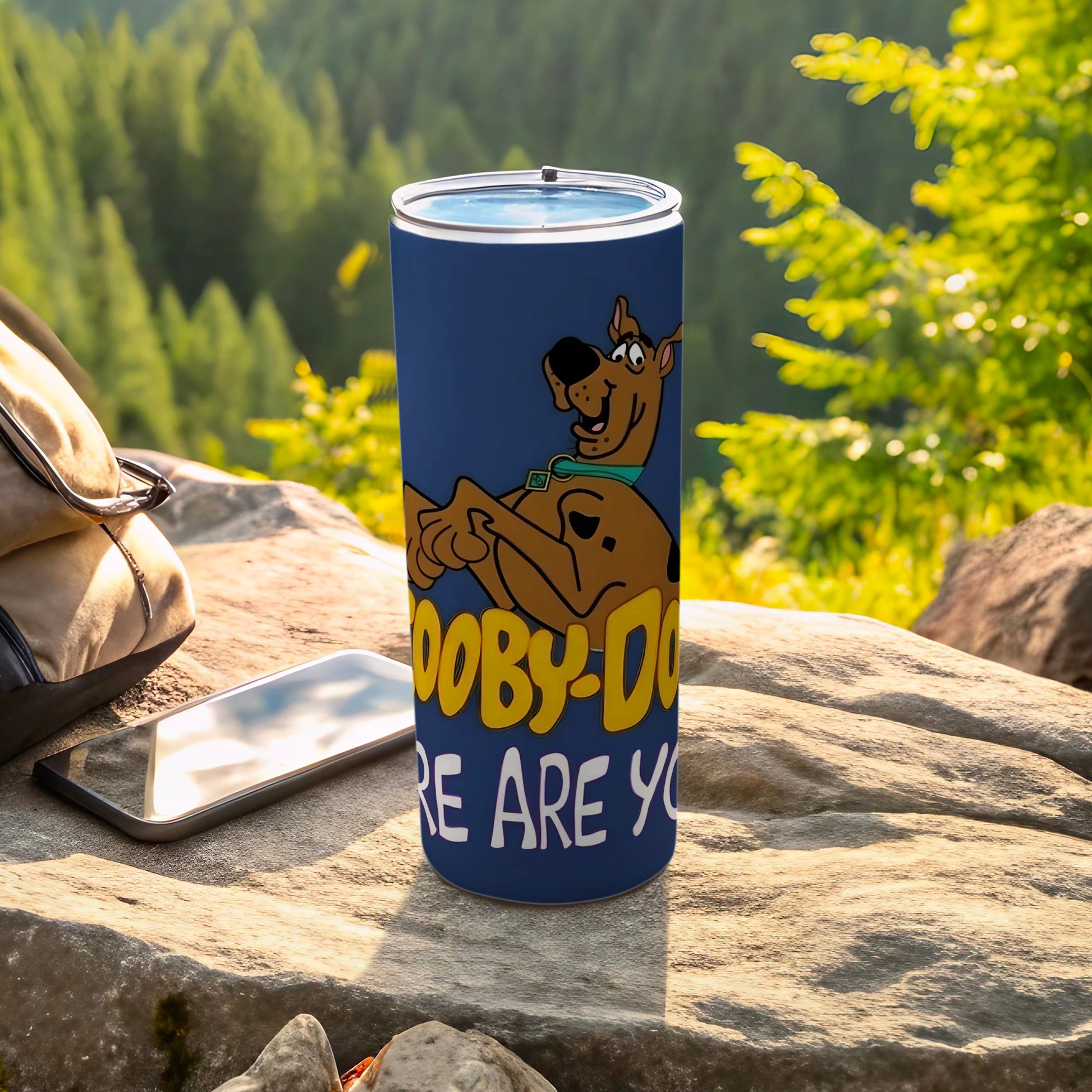 Scooby-Doo tumbler with text "Where Are You?" on a rock.