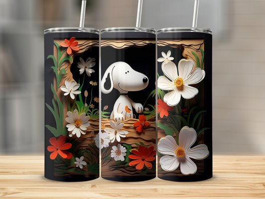 Snoopy surrounded by beautiful flowers tumbler