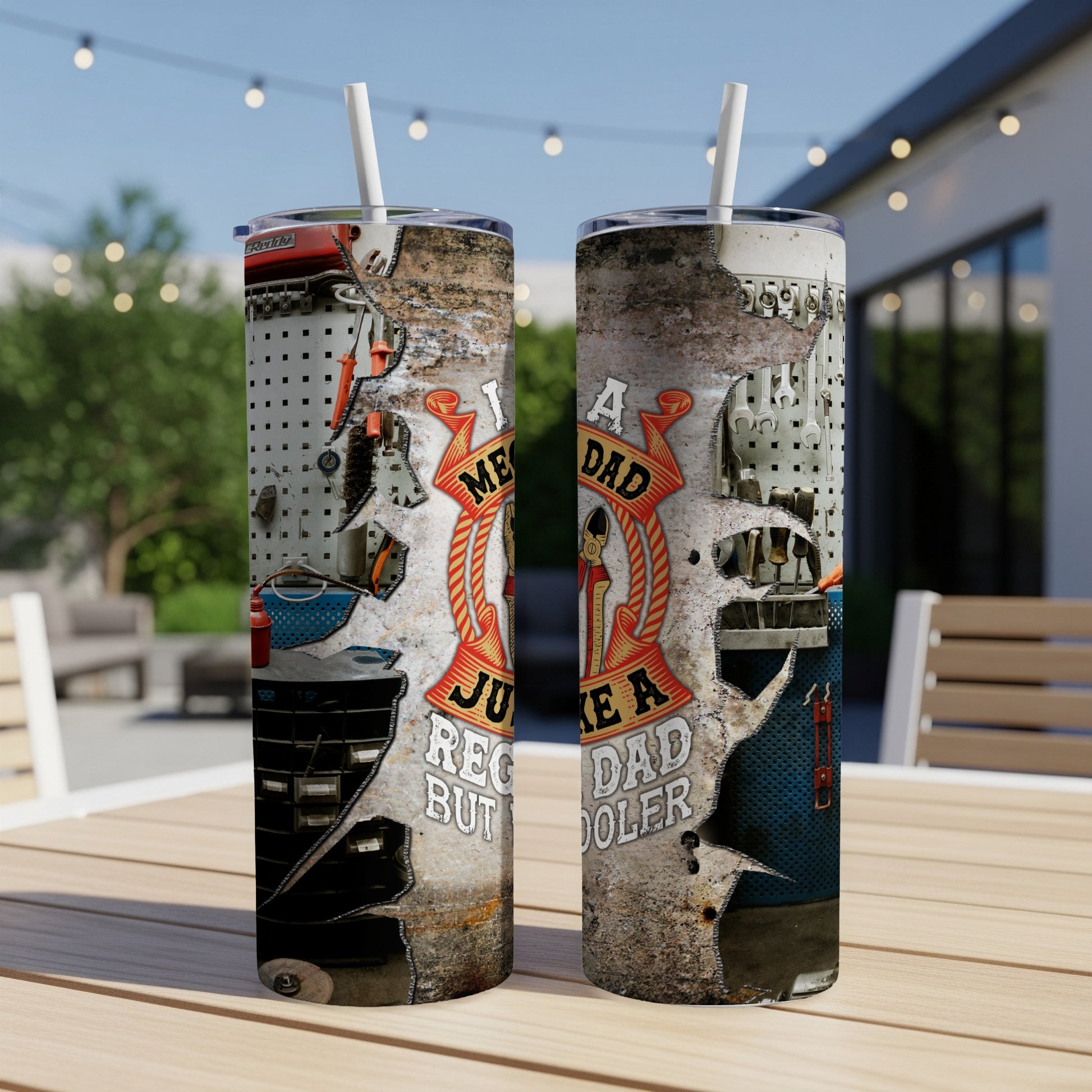 Two tumblers with tool-themed graphics and the text "I'm a regular dad but cooler".