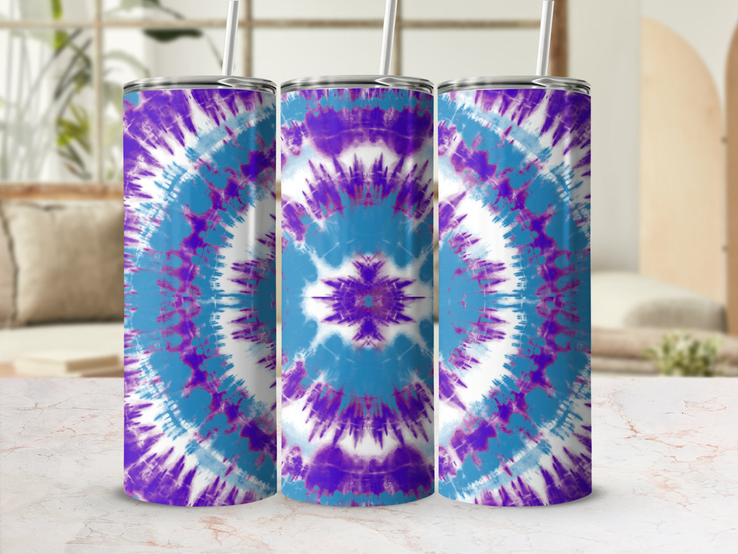 Three tumblers with a purple and blue tie-dye pattern and white straws.