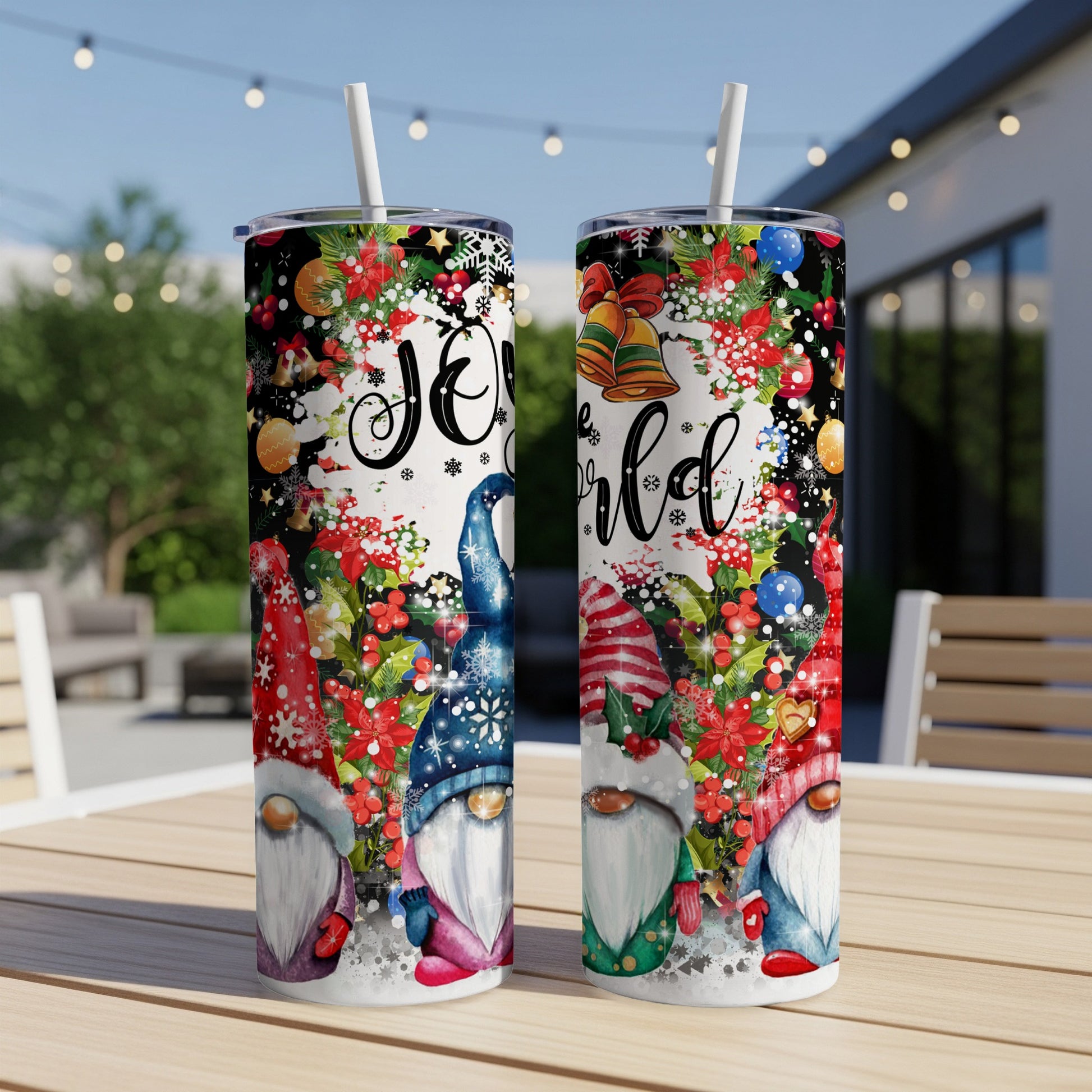 Two tumblers with a Christmas gnome design and "Joy to the world" text.