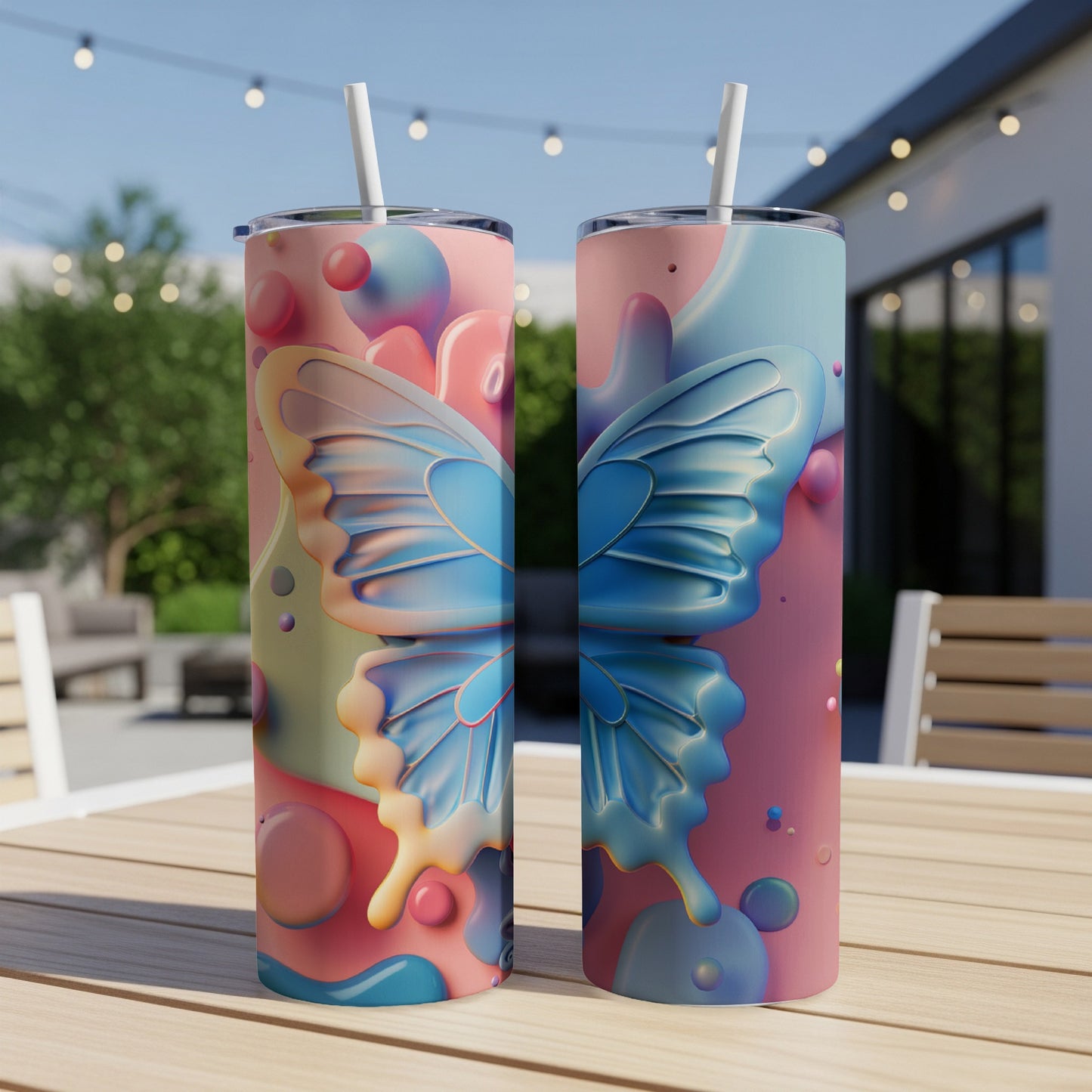 Two tall, insulated tumblers with a pastel butterfly design.