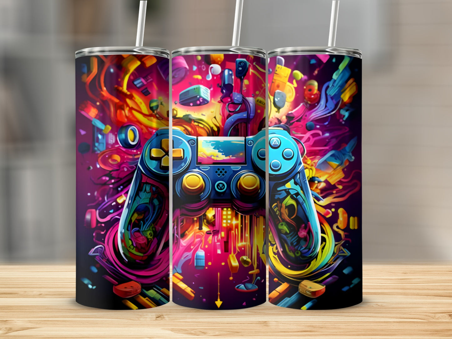Colorful video game controller design on three tumblers.