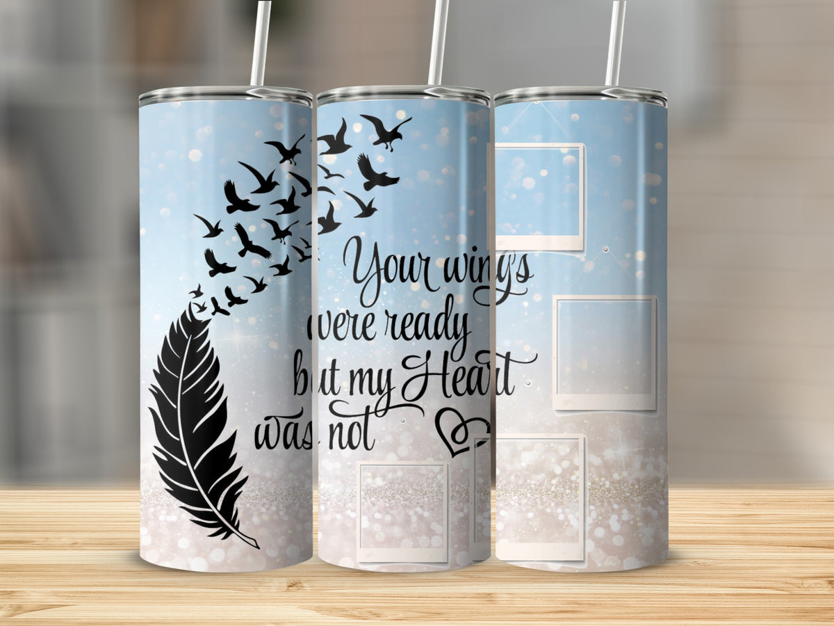 Tumbler with feather, flying birds, and text "Your wings were ready but my Heart was not".