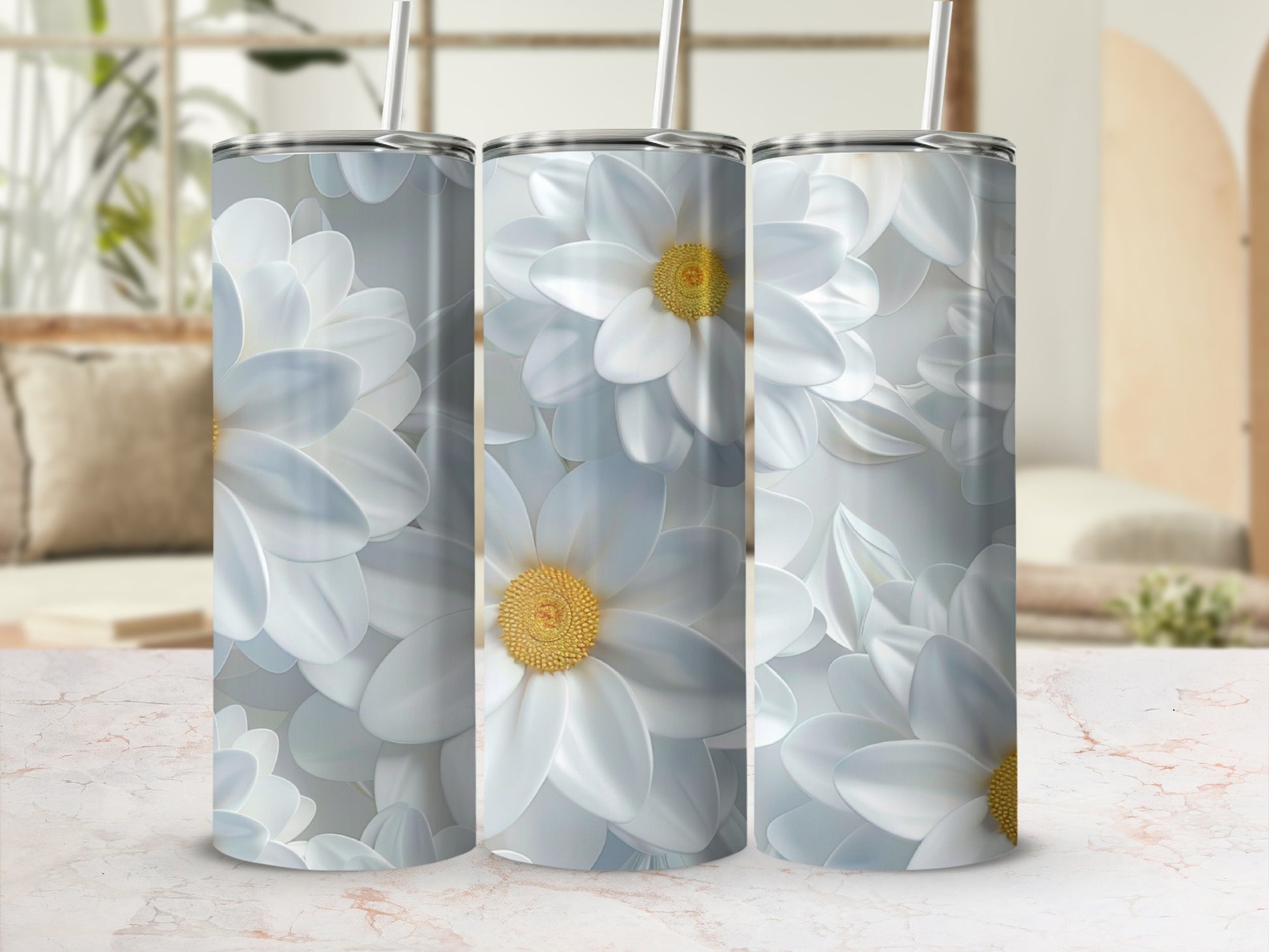 Three white floral tumblers with yellow centers on a marble surface.