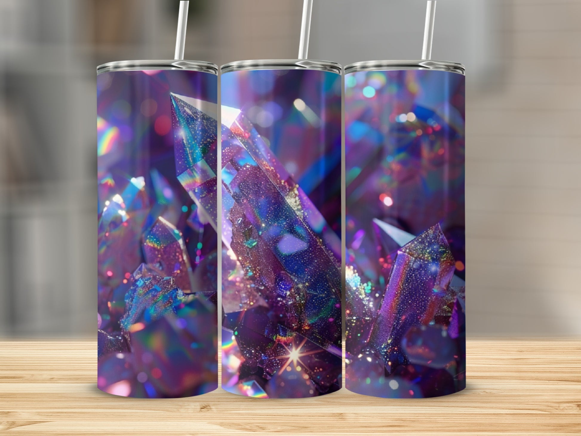 Three tumblers with iridescent crystal and bokeh background design.