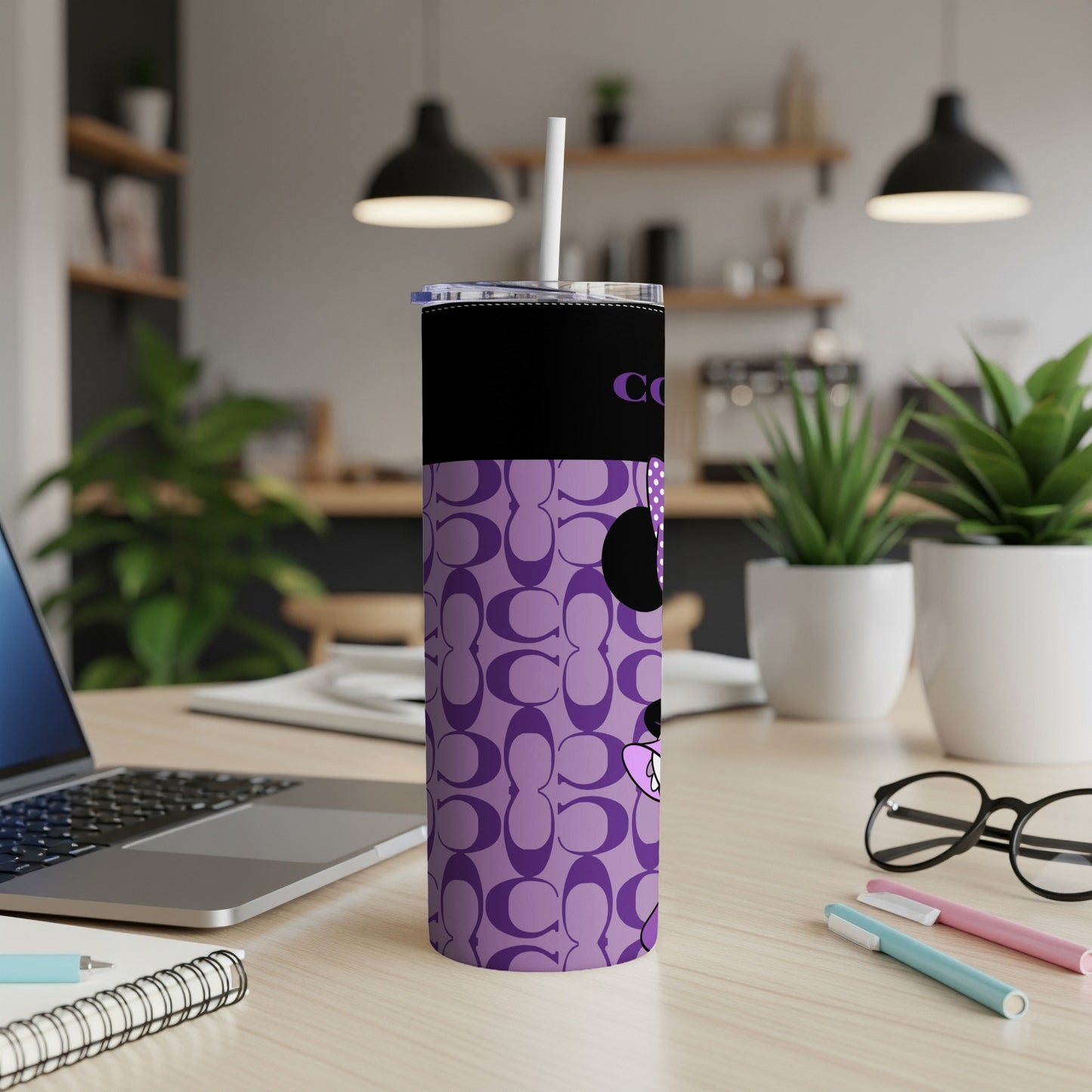 Purple tumbler with repeating logo pattern and Minnie Mouse character graphic.