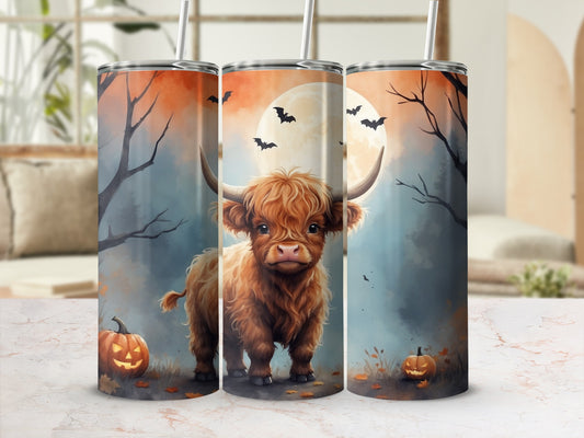 Highland cow with pumpkins and bats under a full moon.